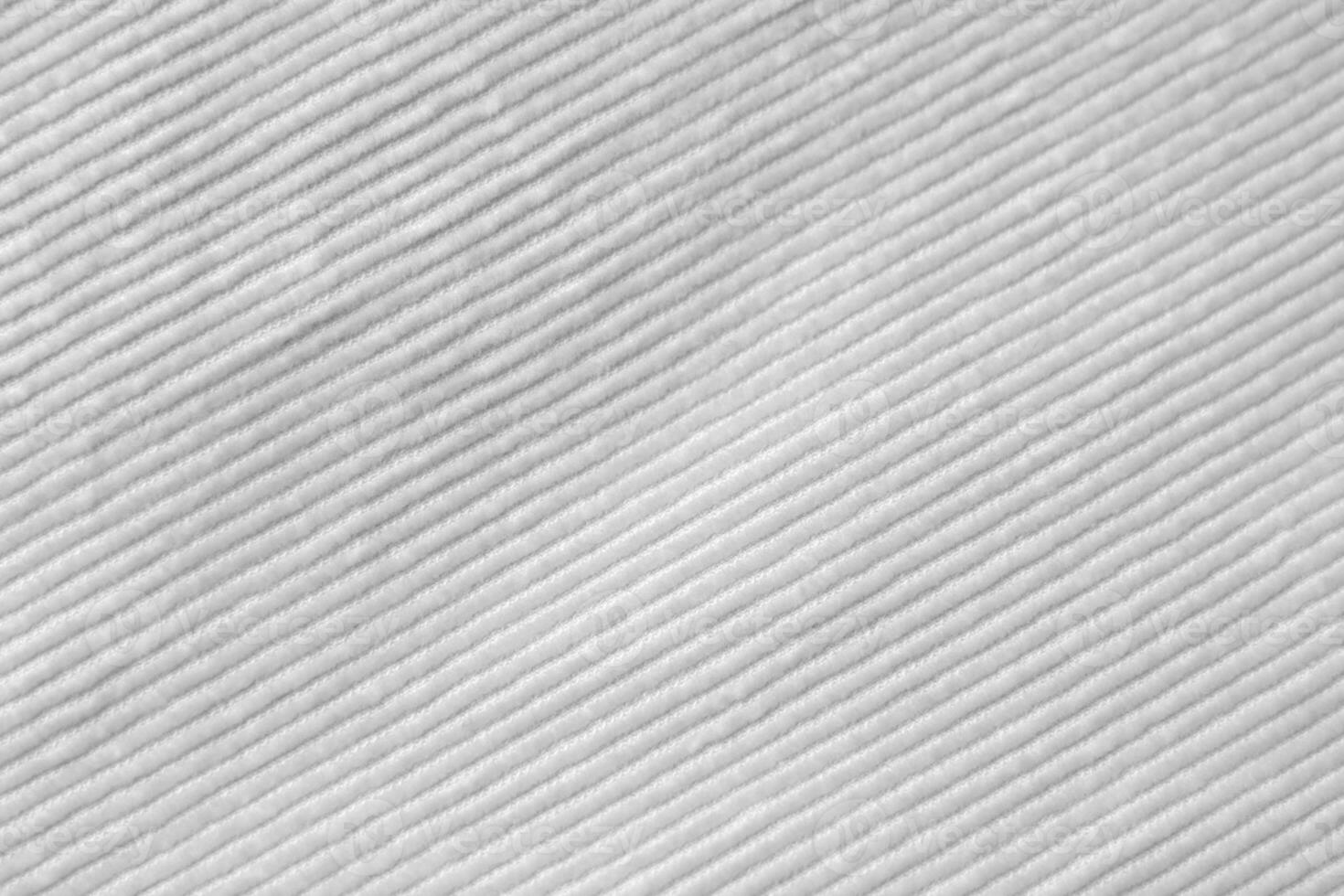 white corduroy fabric texture used as background. clean fabric background of soft and smooth textile material. cloth, velvet, .luxury white tone for silk. photo