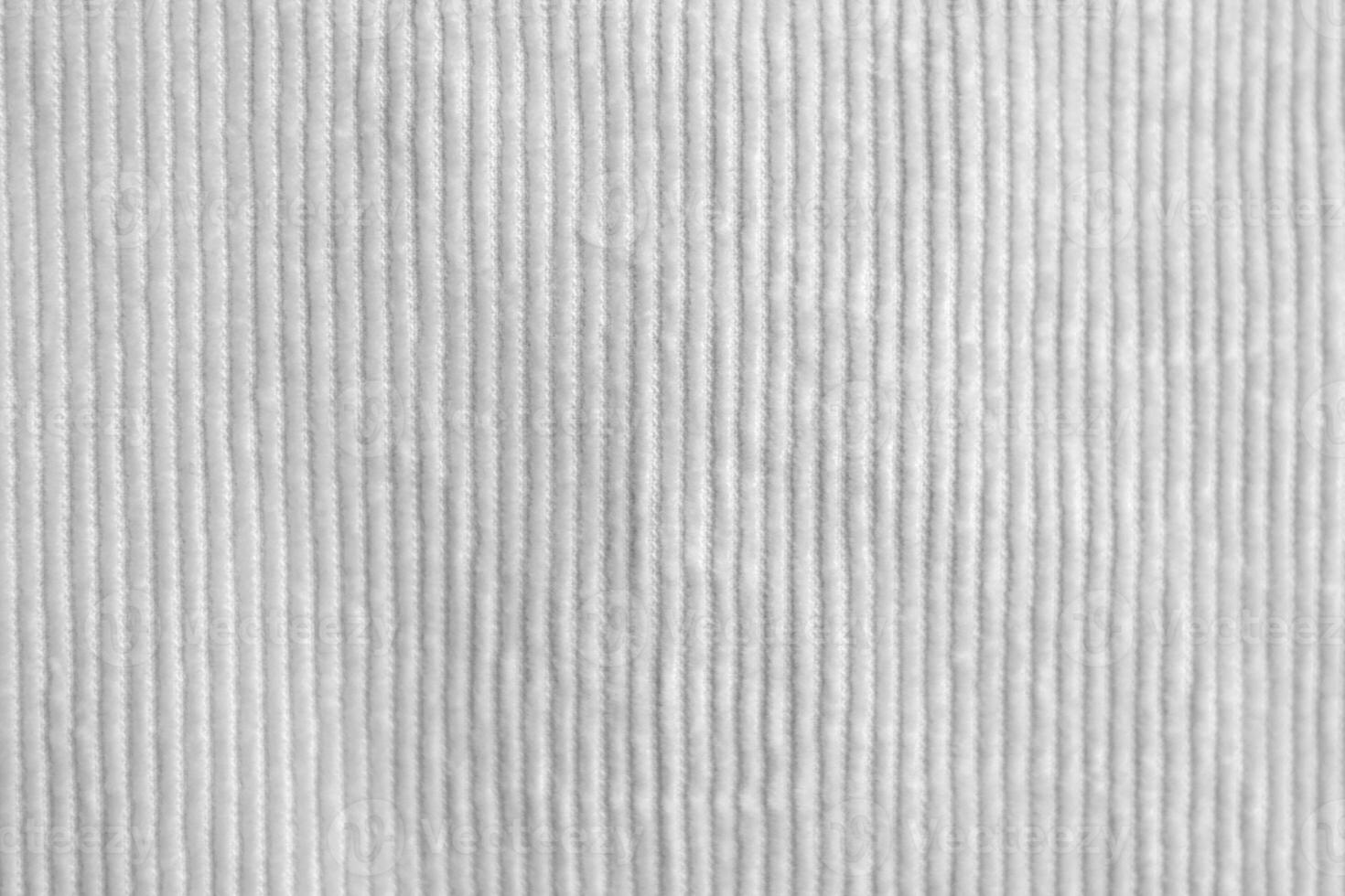 white corduroy fabric texture used as background. clean fabric background of soft and smooth textile material. cloth, velvet, .luxury white tone for silk. photo