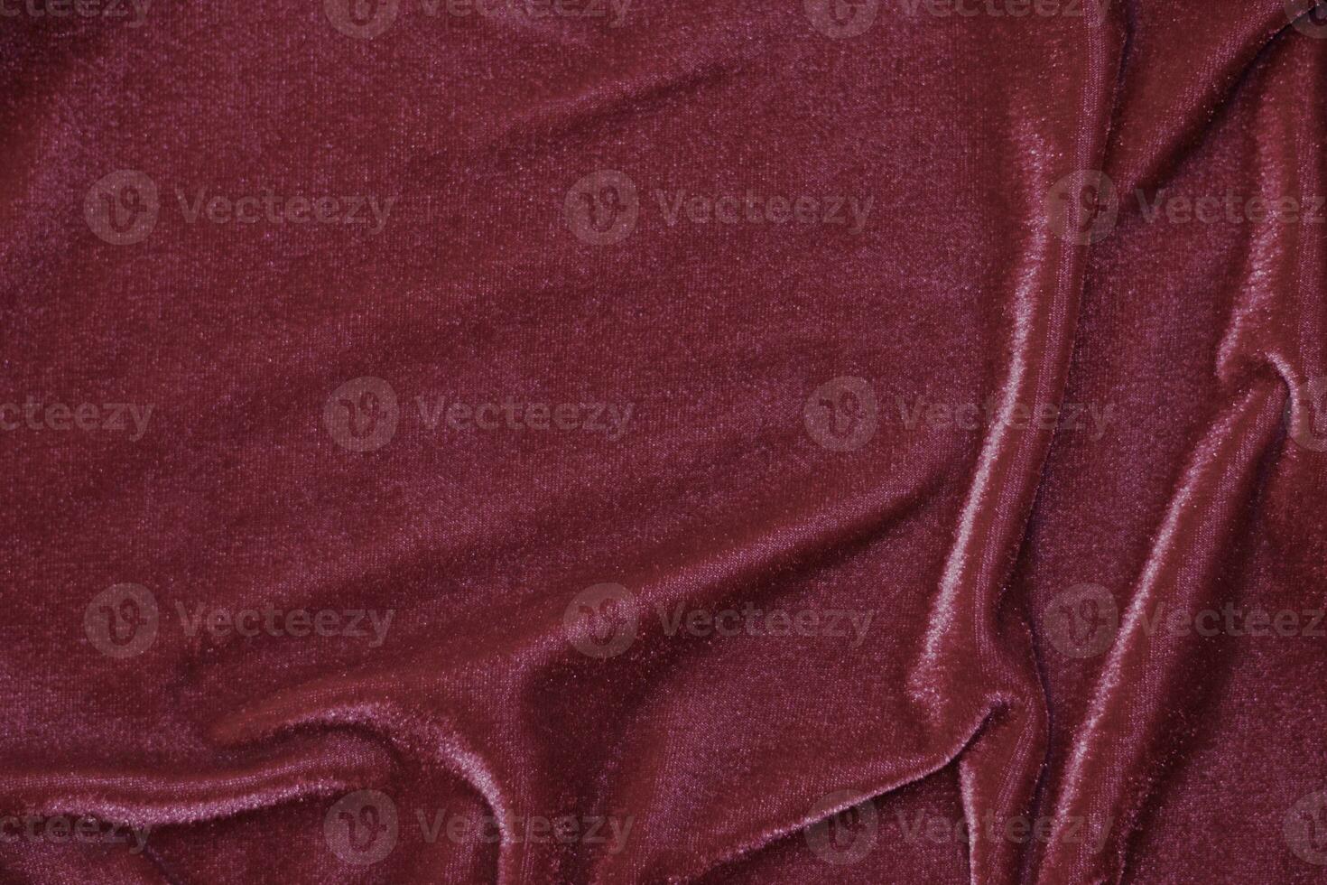 red velvet fabric texture used as background. Empty red fabric background of soft and smooth textile material. There is space for text... photo