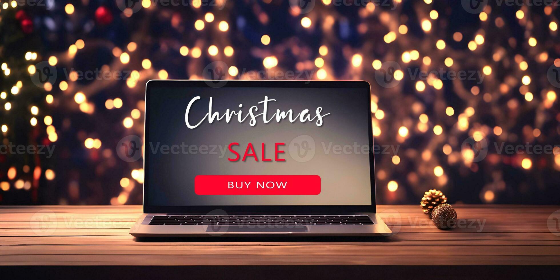 Laptop with Christmas sale sign on the screen. Online shopping concept. photo