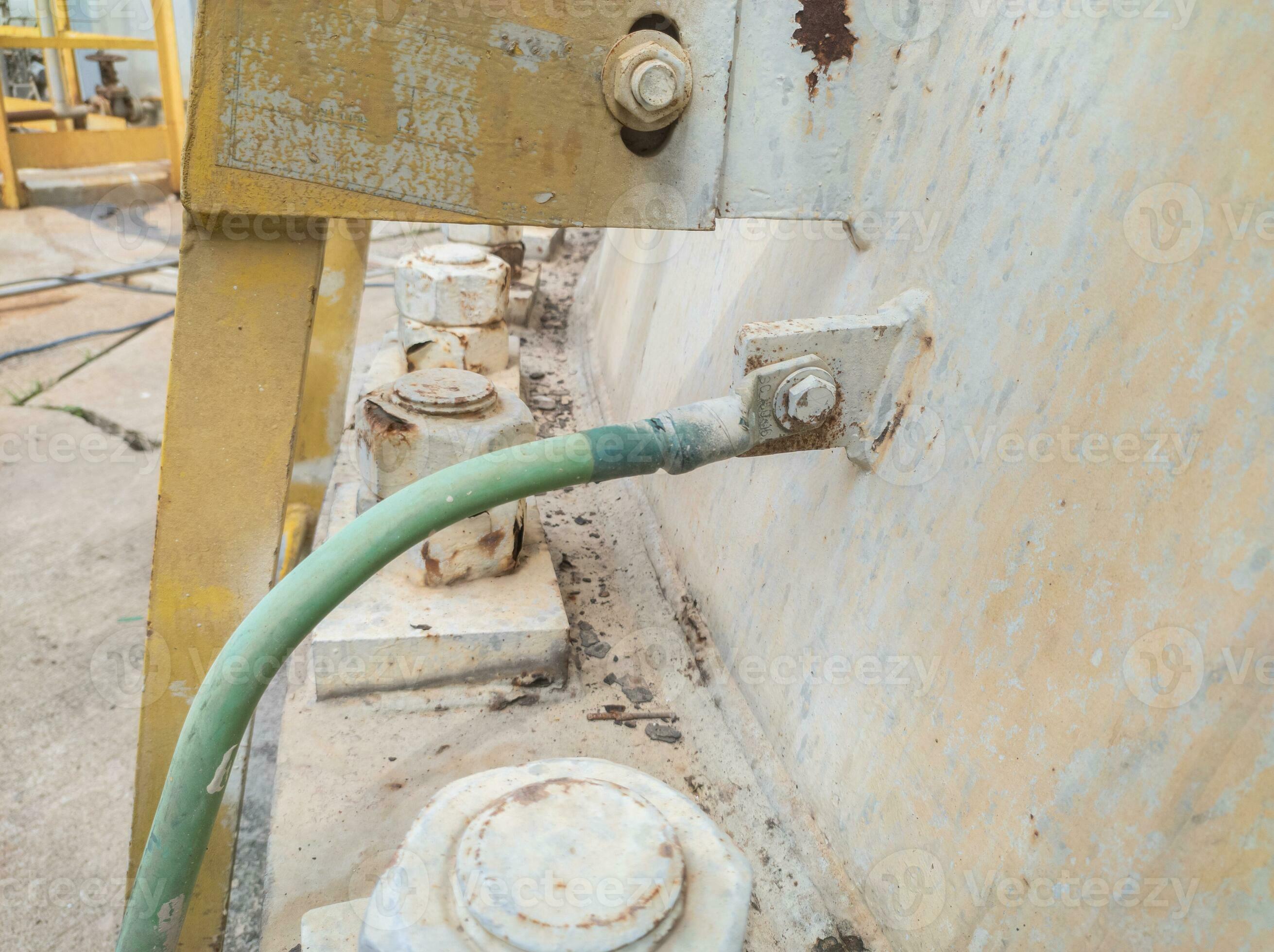 grounding electrical cables and copper rods planted in the ground