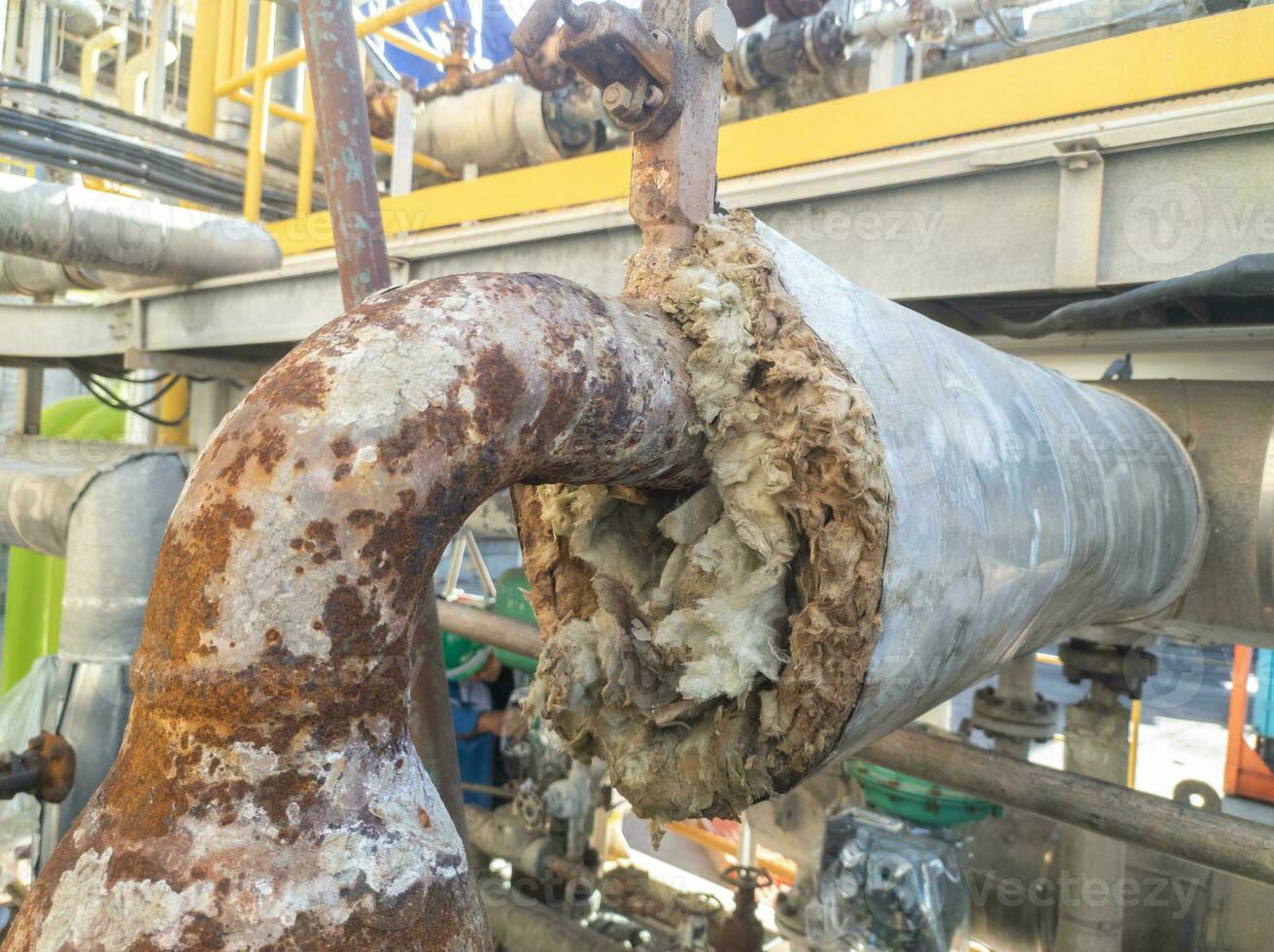Steam pipe lines wrapped in glass wool function to maintain hot or cold temperatures photo