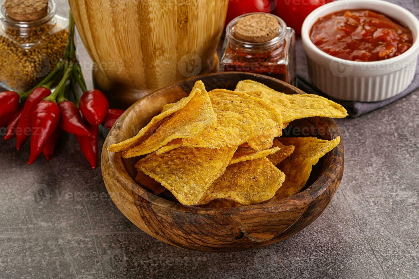 Mexican corn nachos chips with salsa photo