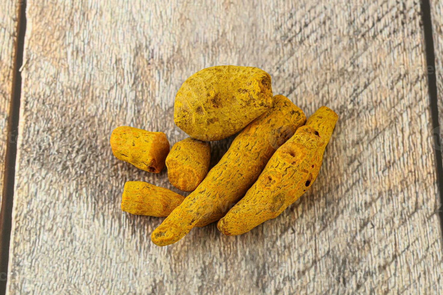 Indian spices - Turmeric root Curcuma photo