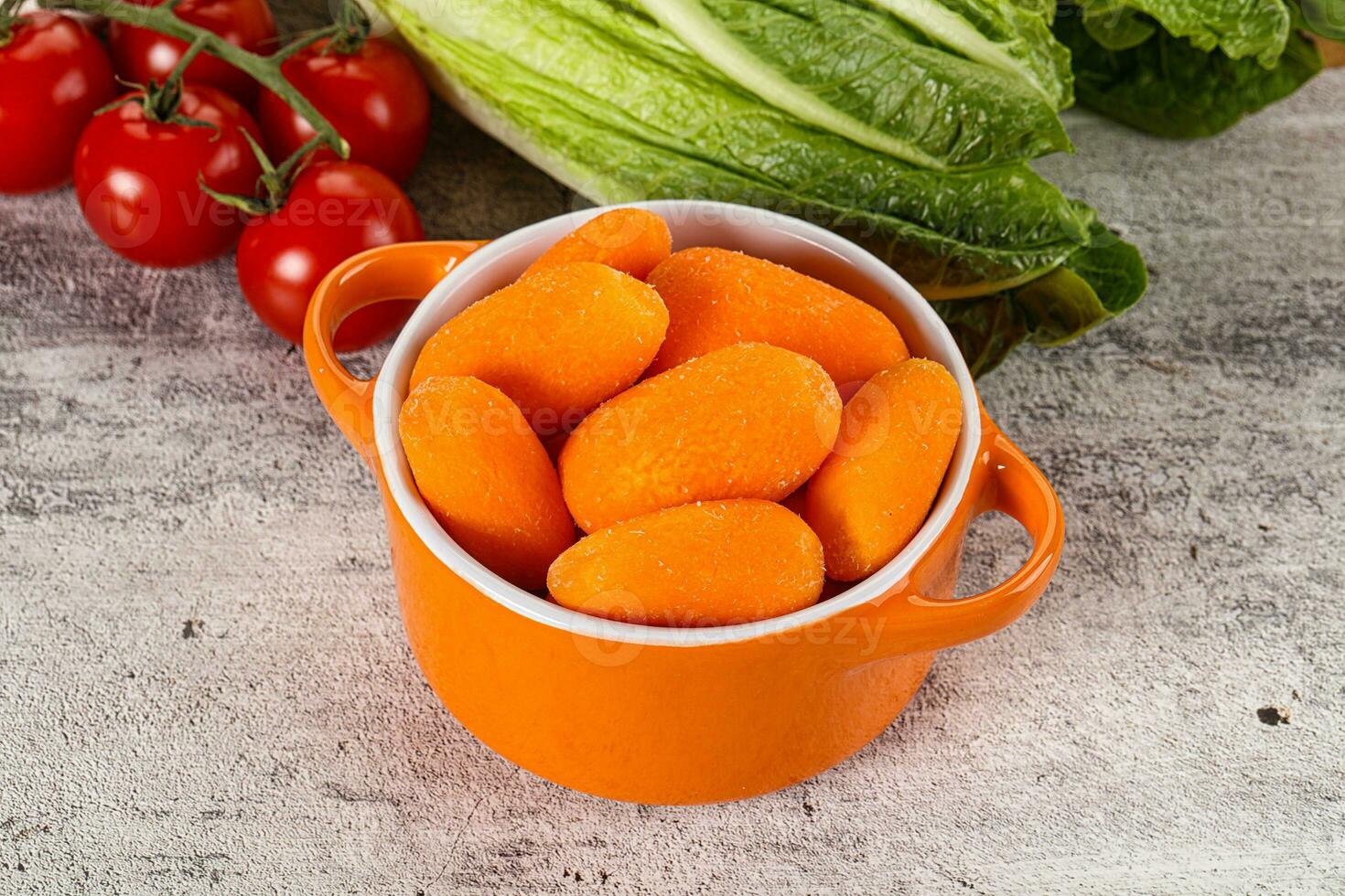 Small baby mini organic carrot photo