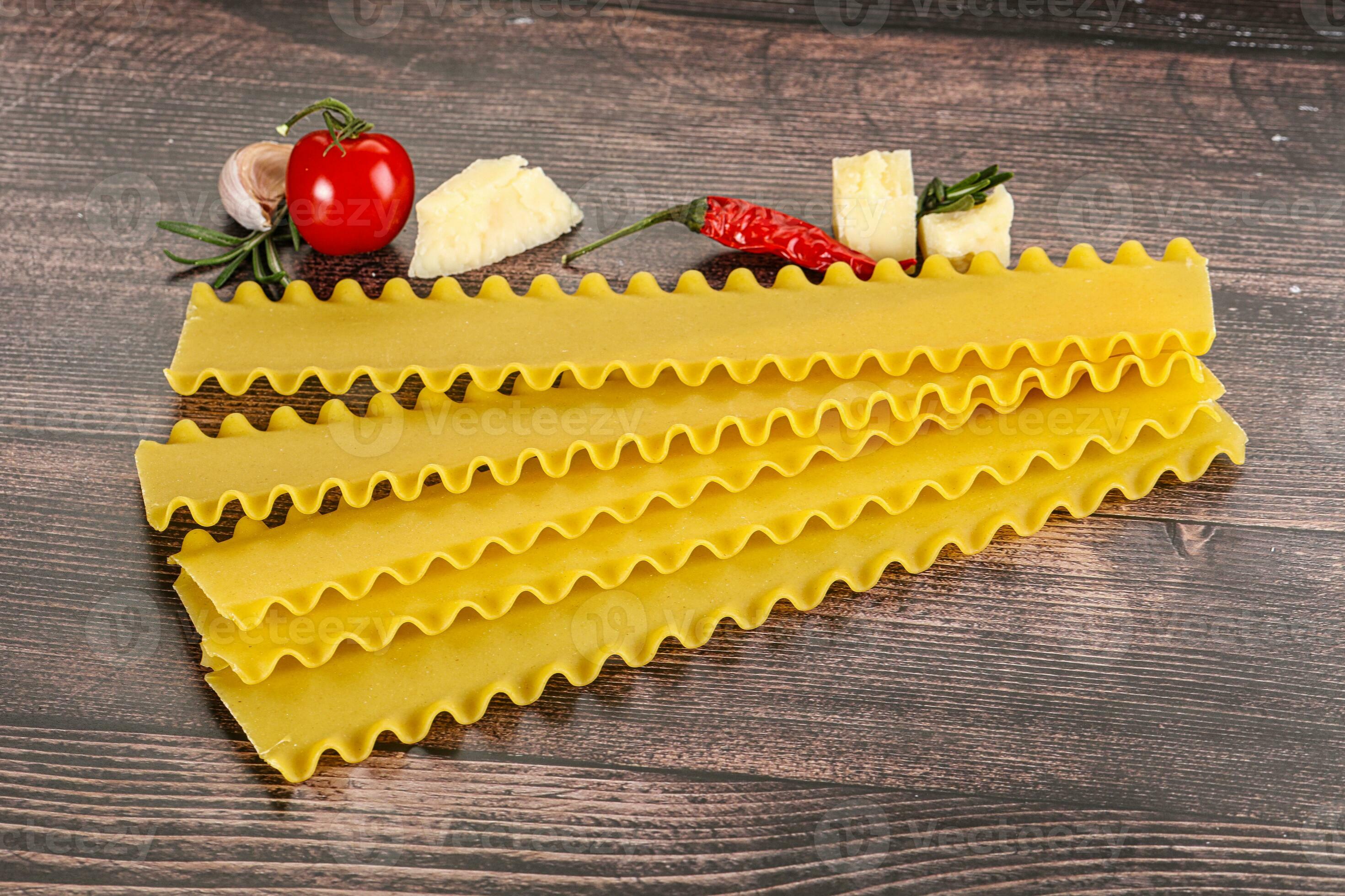 Uncooked raw Lasagna dry sheets 35332099 Stock Photo at Vecteezy