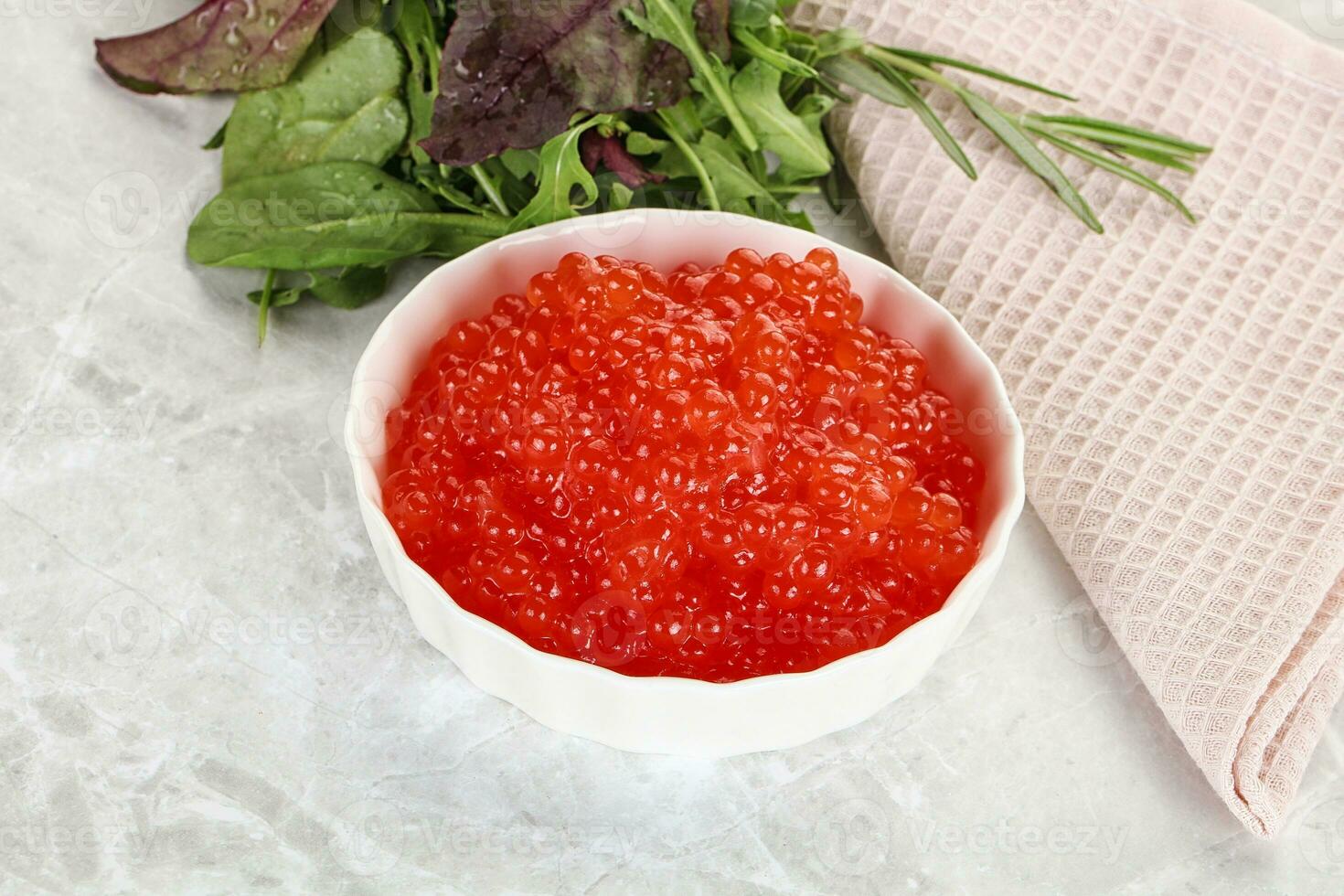 Red caviar in the bowl photo
