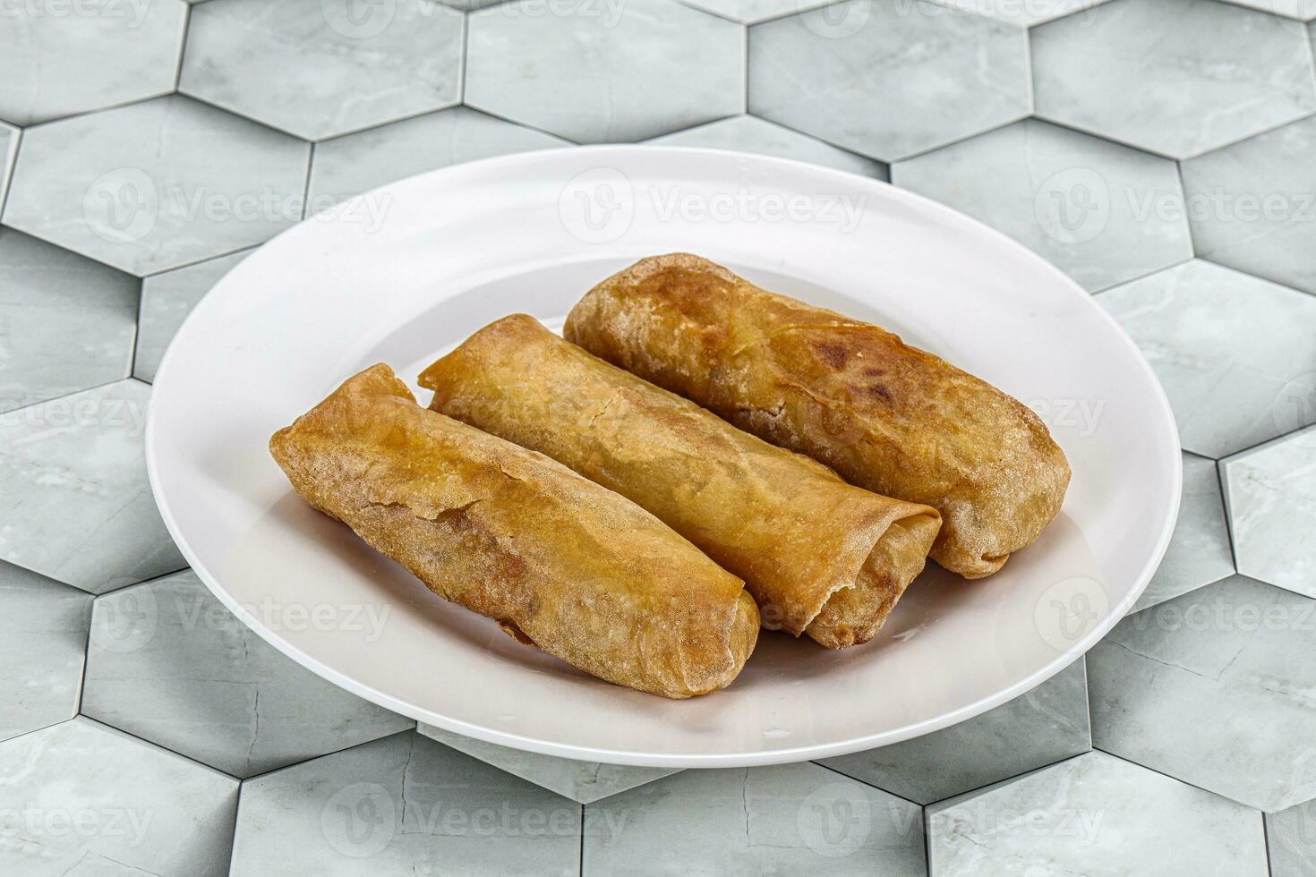 Traditional crispy fried stuffed springroll photo