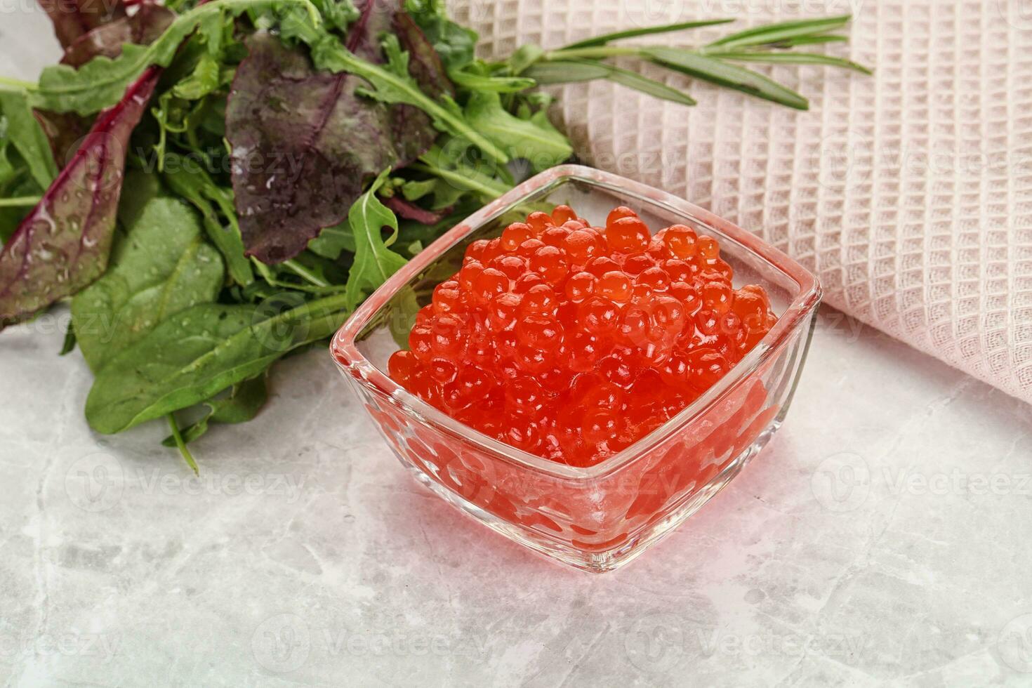 Red caviar in the bowl photo