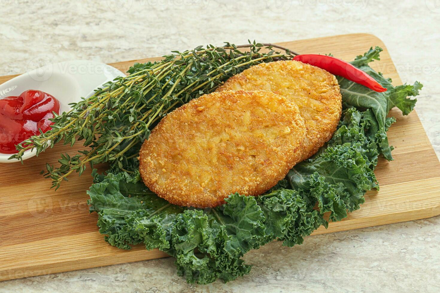Fried crusty potato hashbrown pancake photo