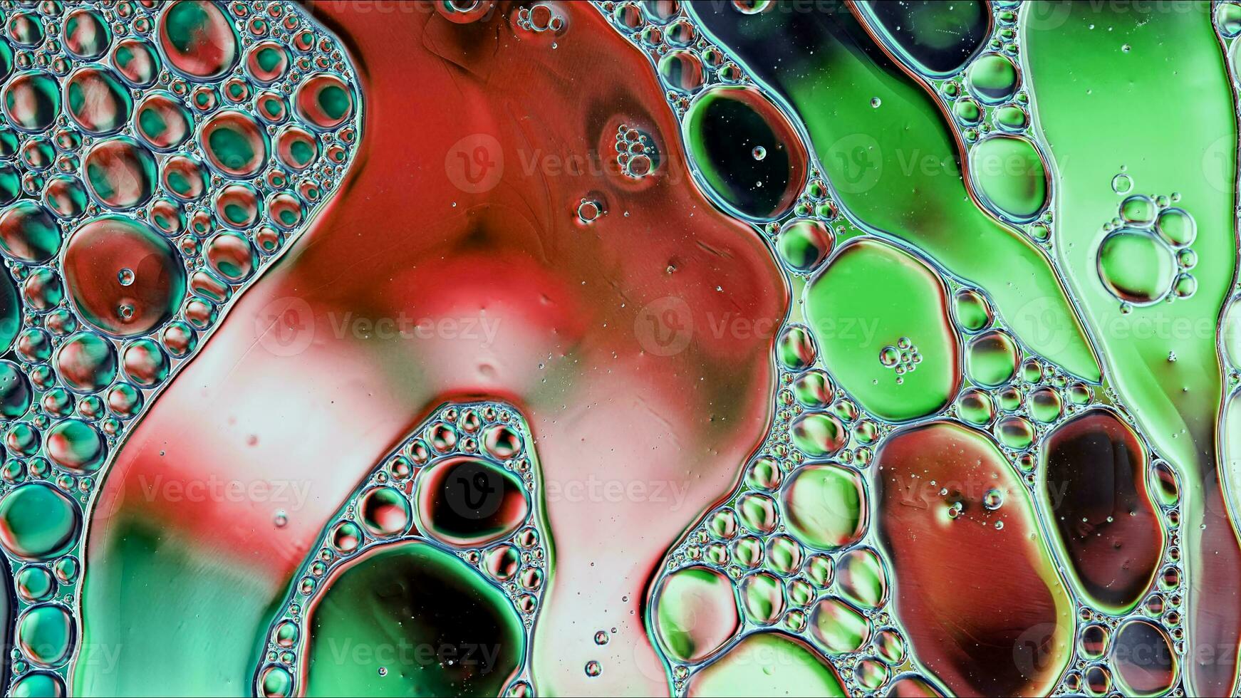 Abstract Colorful Food Oil Drops Bubbles and spheres Flowing on Water Surface photo