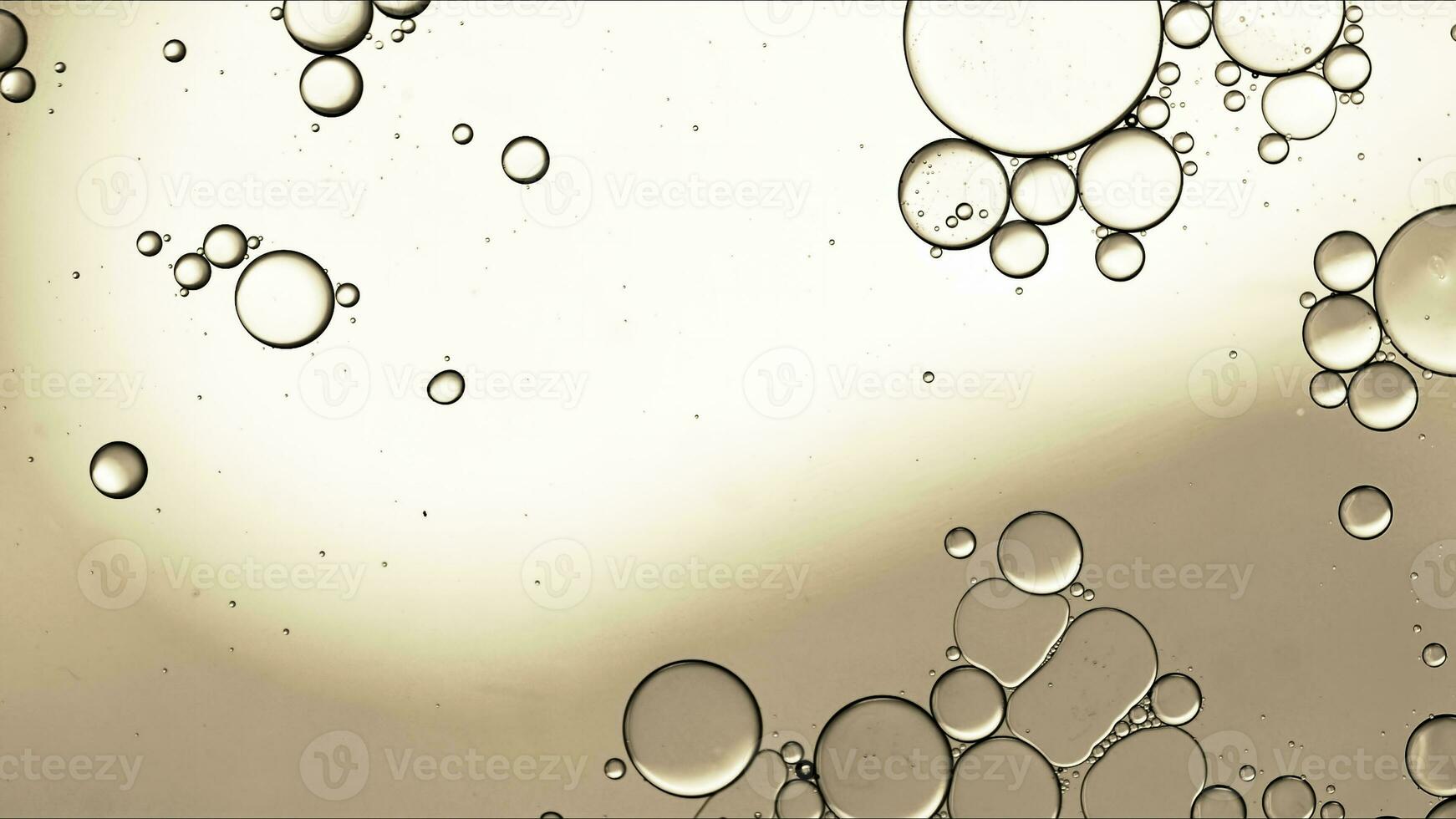 Abstract Colorful Food Oil Drops Bubbles and spheres Flowing on Water Surface photo