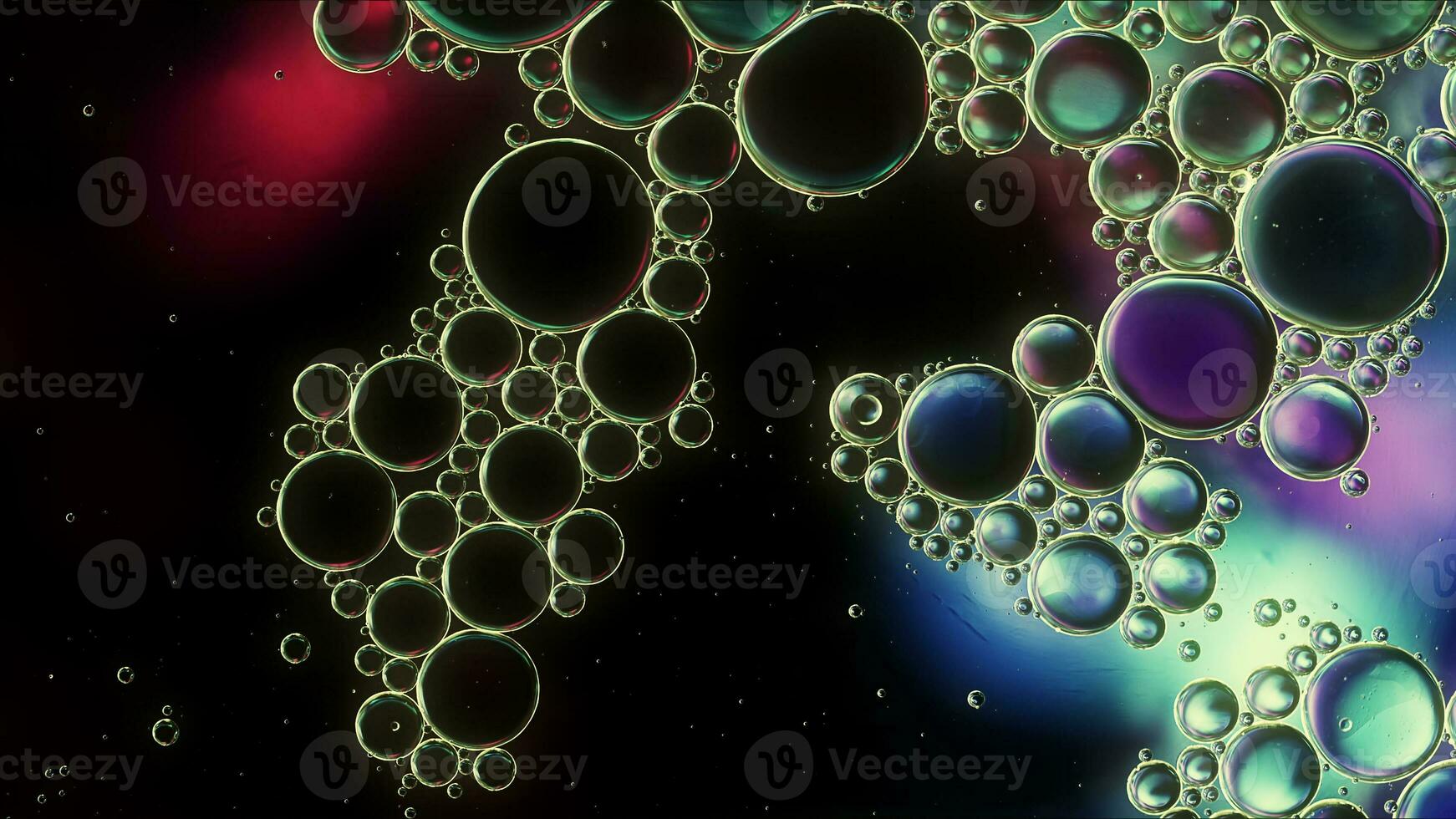 Abstract Colorful Food Oil Drops Bubbles and spheres Flowing on Water Surface photo