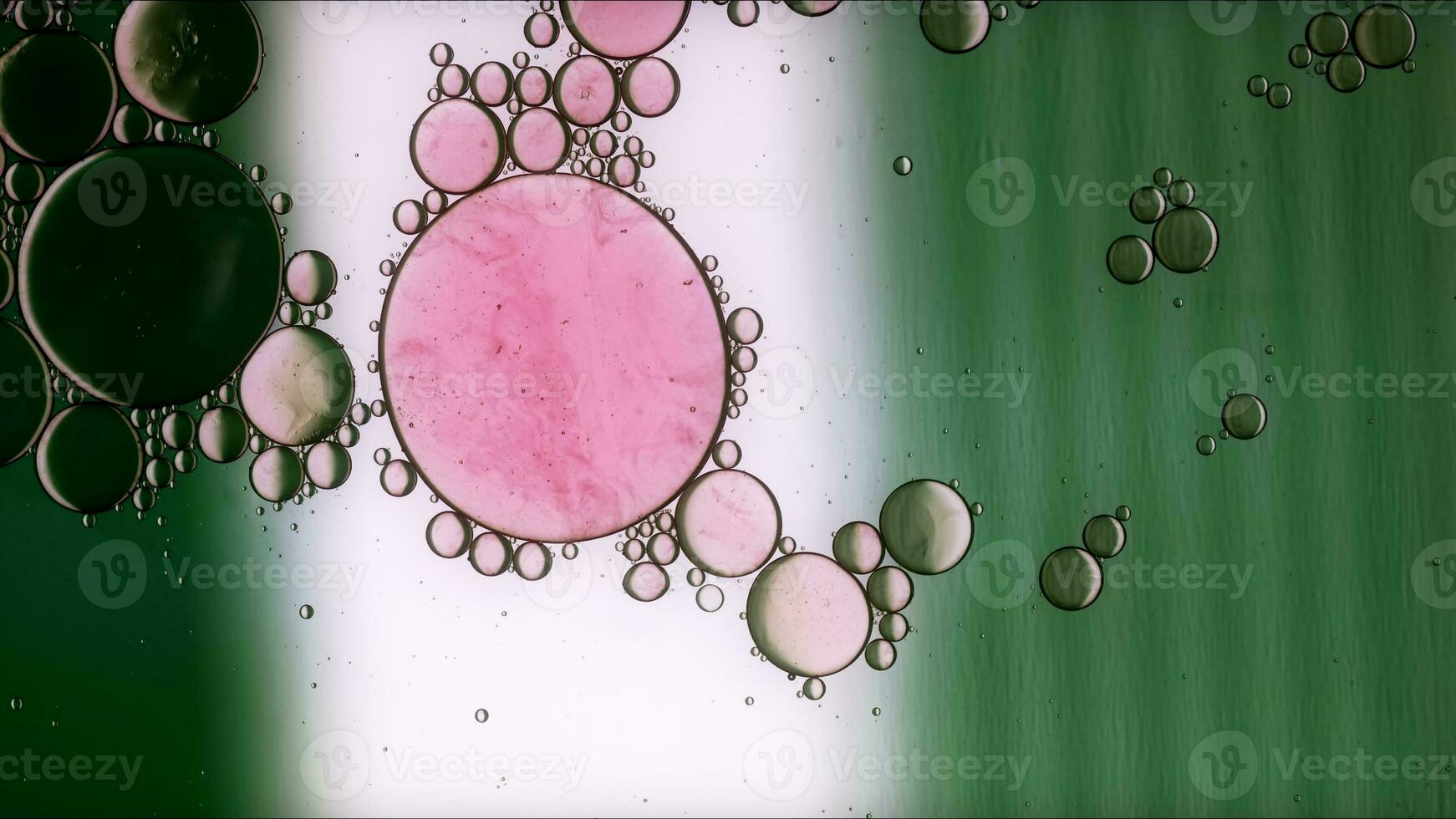 Abstract Colorful Food Oil Drops Bubbles and spheres Flowing on Water Surface photo