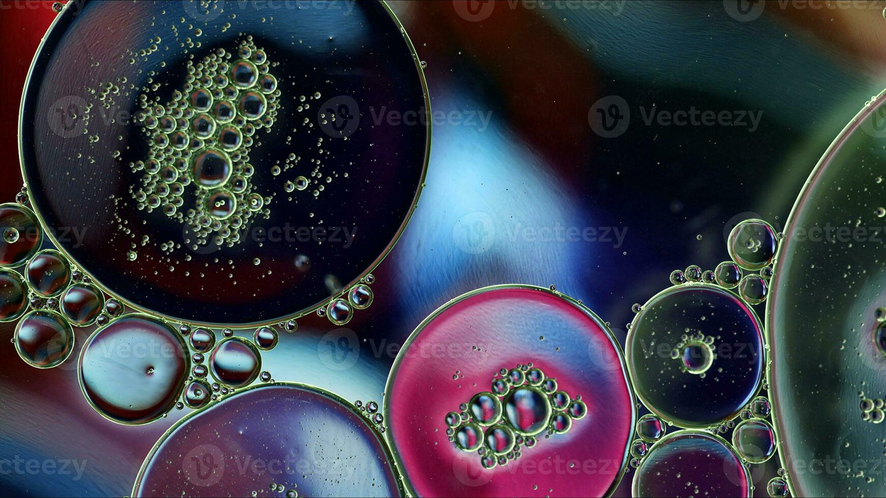 Abstract Colorful Food Oil Drops Bubbles and spheres Flowing on Water Surface photo