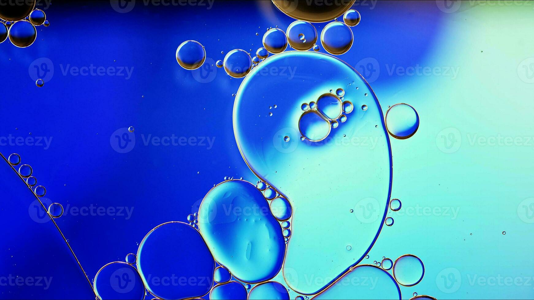 Abstract Colorful Food Oil Drops Bubbles and spheres Flowing on Water Surface photo