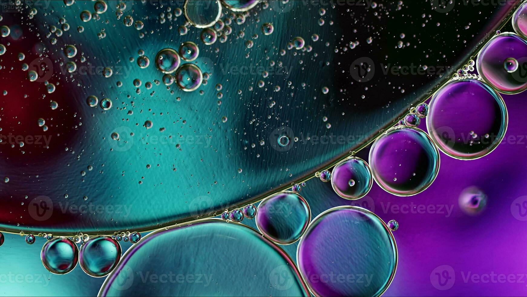 Abstract Colorful Food Oil Drops Bubbles and spheres Flowing on Water Surface photo