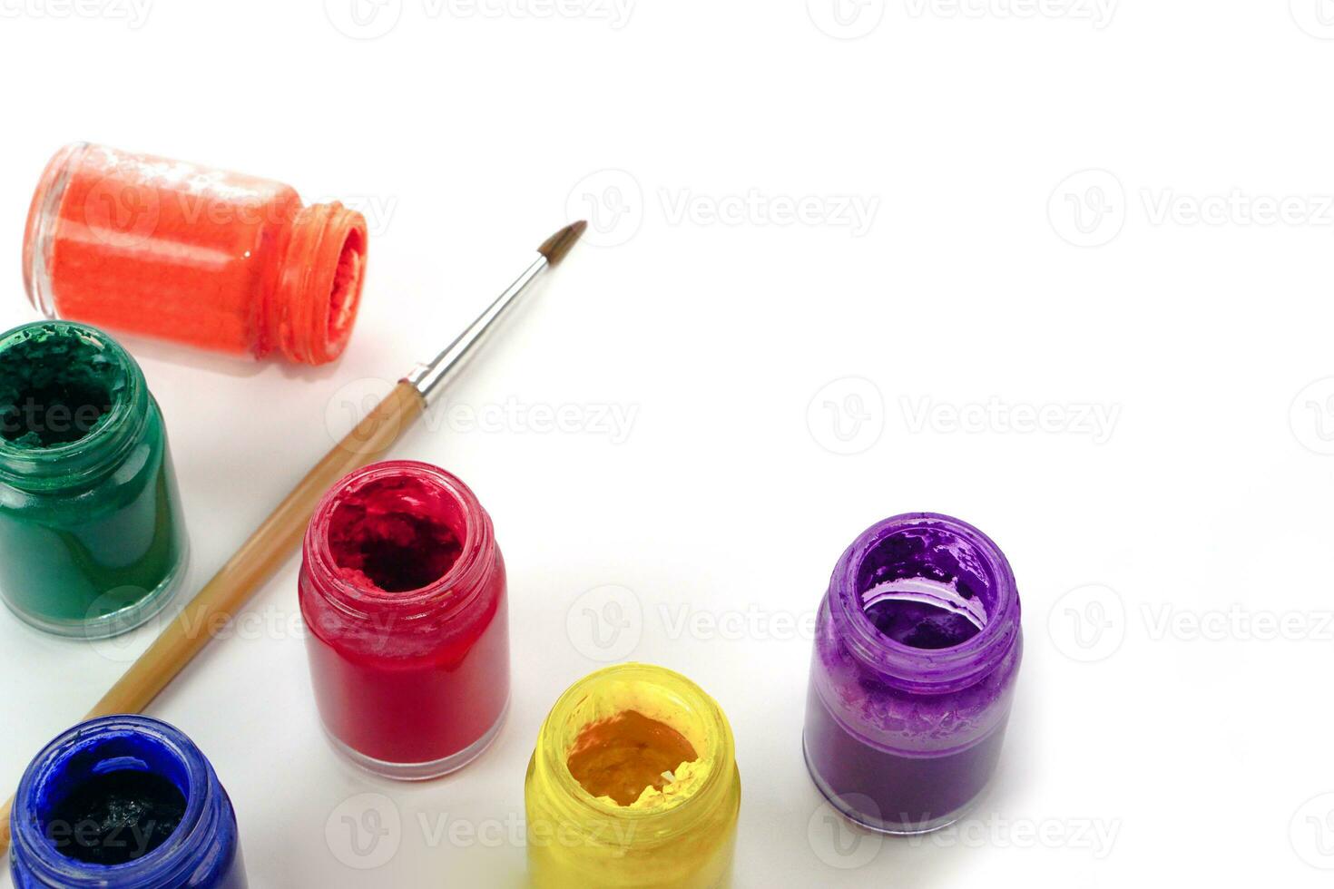Watercolor bottles and blur paintbrush on white background. Learning and paintings art concept. photo