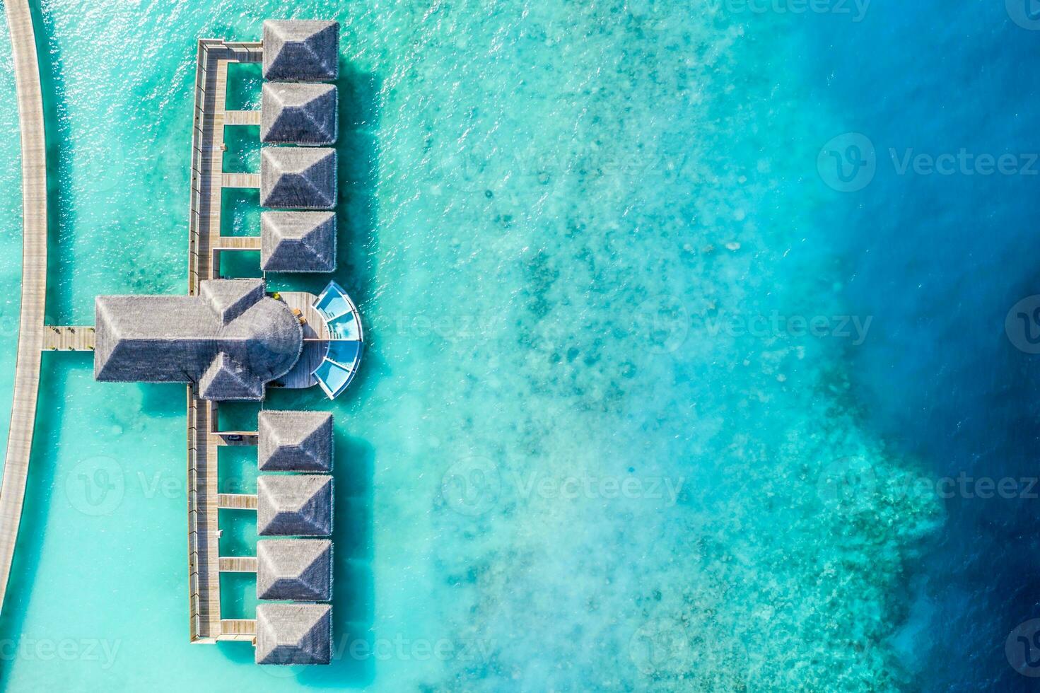 Maldives paradise lagoon bay. Tropical aerial landscape, seascape long pier bridge water villas with amazing sea coastline beach, tropical nature. Exotic tourism destination. Best summer vacation photo