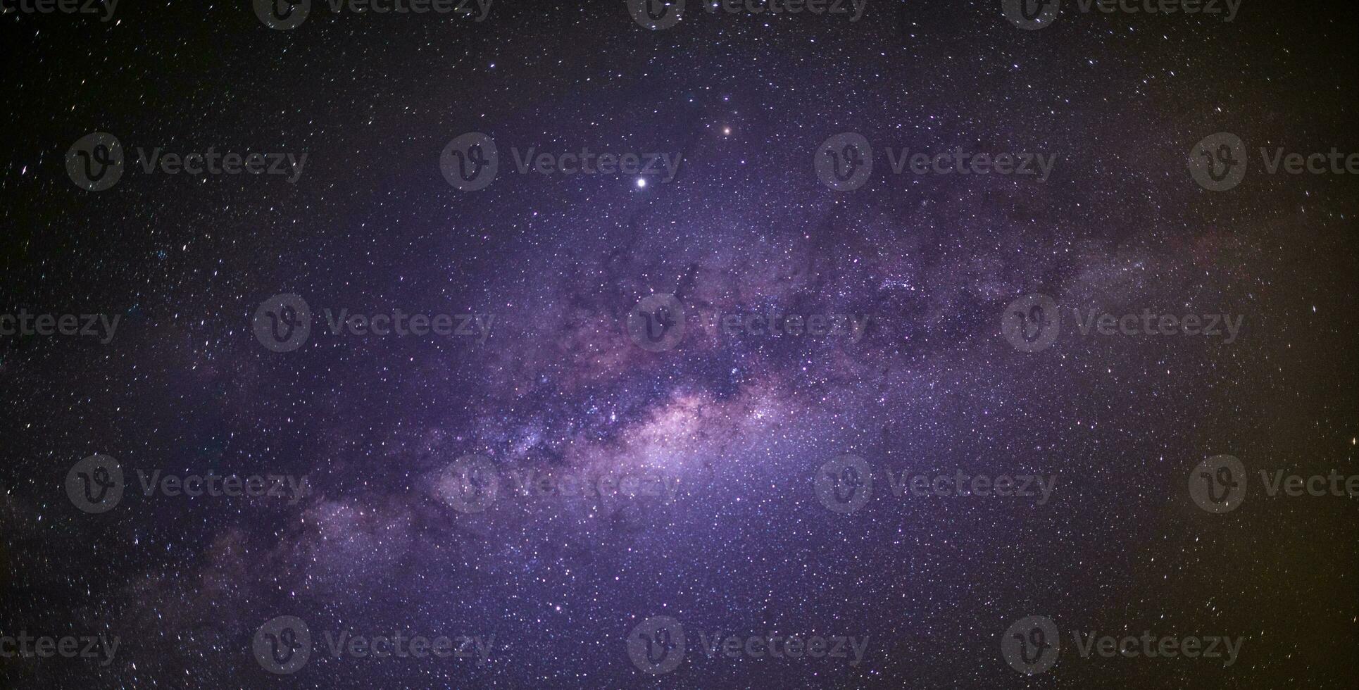 Panorama view universe space shot of milky way galaxy with stars on a night sky background. The Milky Way is the galaxy that contains our Solar System. photo