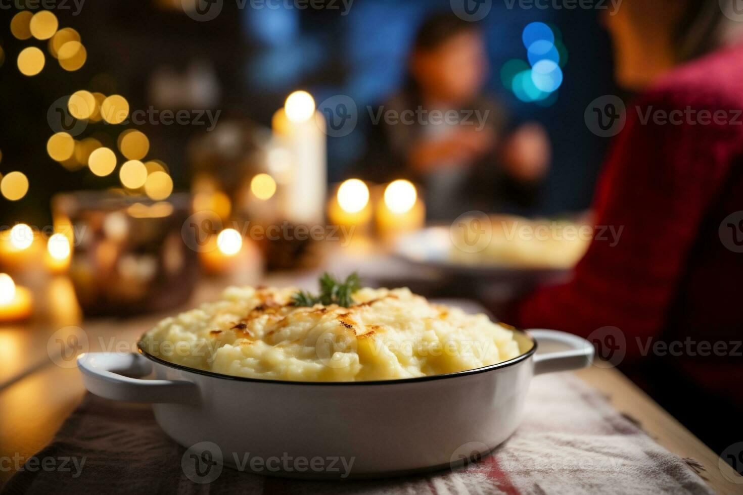 AI generated Mashed potatoes served on festive table with family in background at home photo