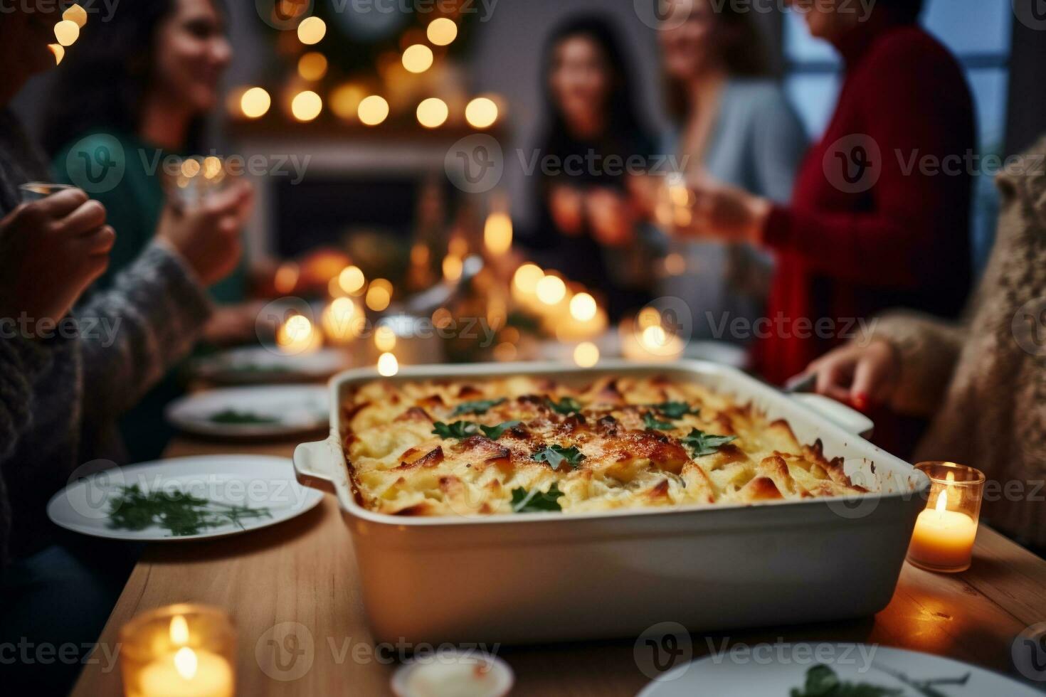 AI generated Close up of a baking dish with food on the background of a group of friends celebrating Christmas photo