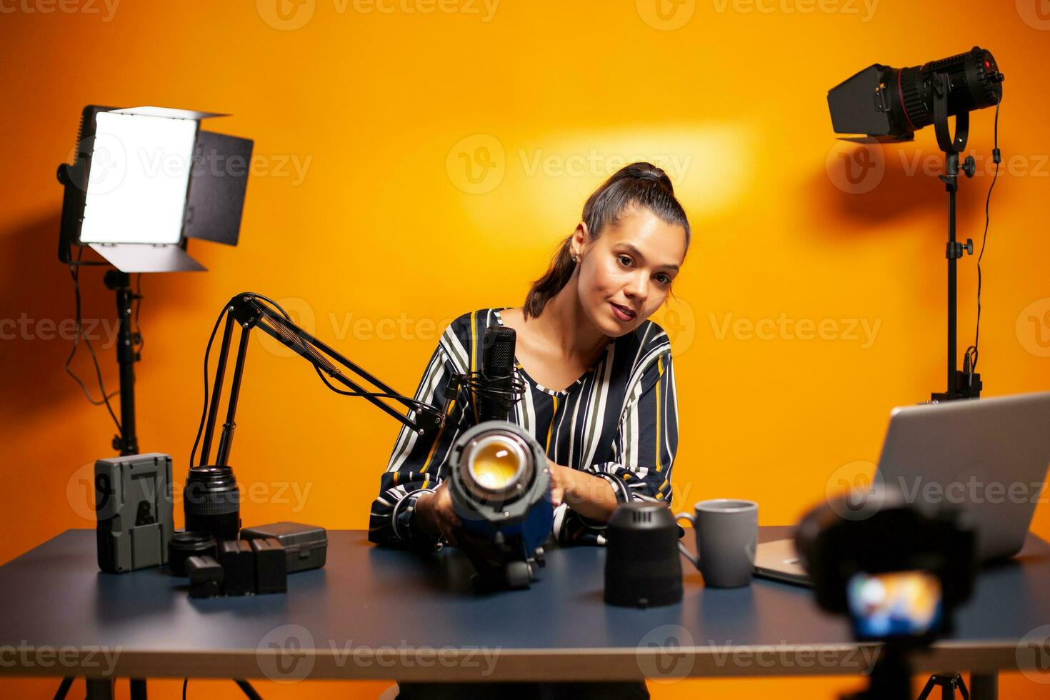 Presenting studio light for vlog production in home studio. Social media star making online internet content about video equipment for web subscribers and distribution, film photo