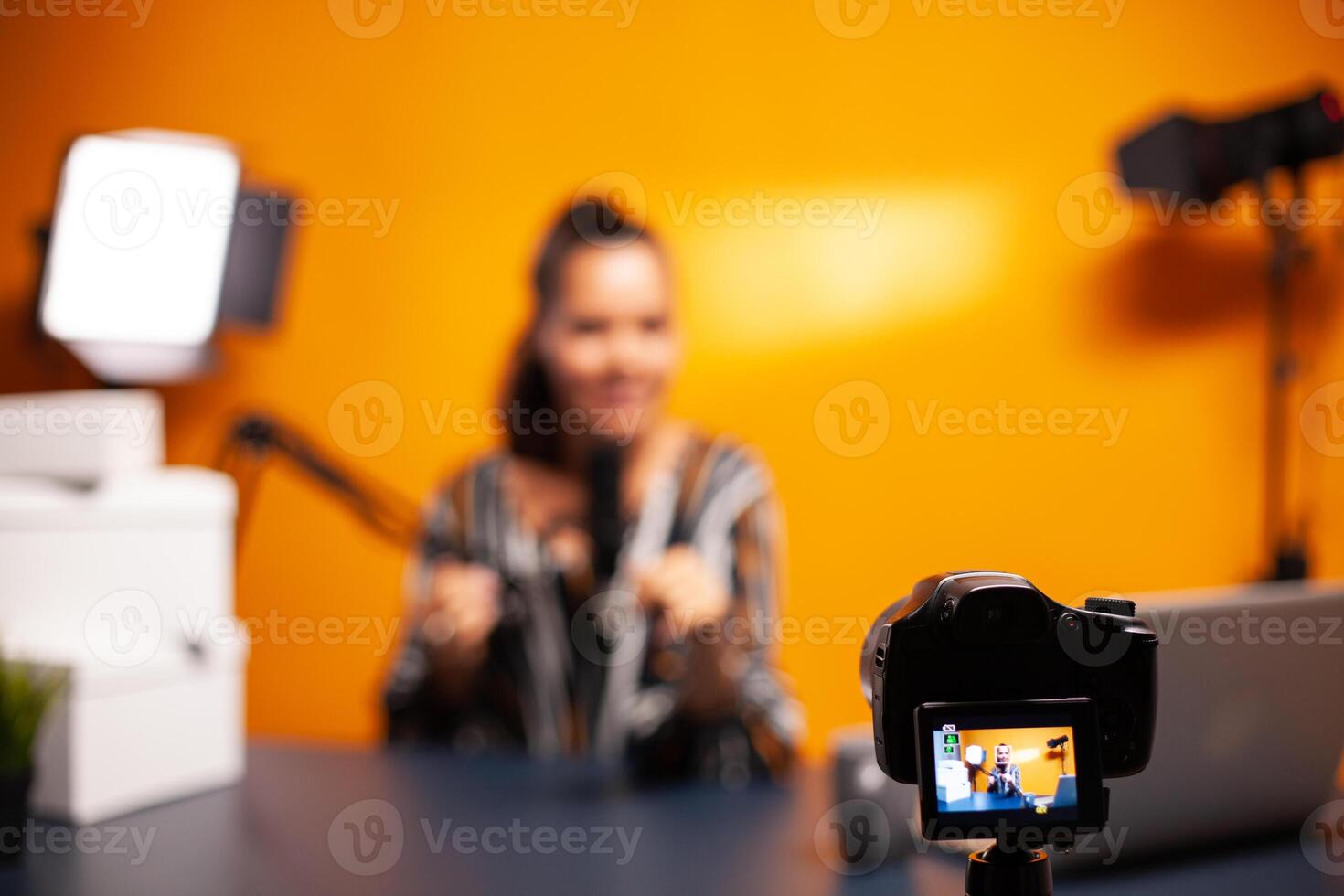 Professional camera in home studio to record vlog. Creative content creator influencer expert vlogger recording online internet web podcast gift for audience photo