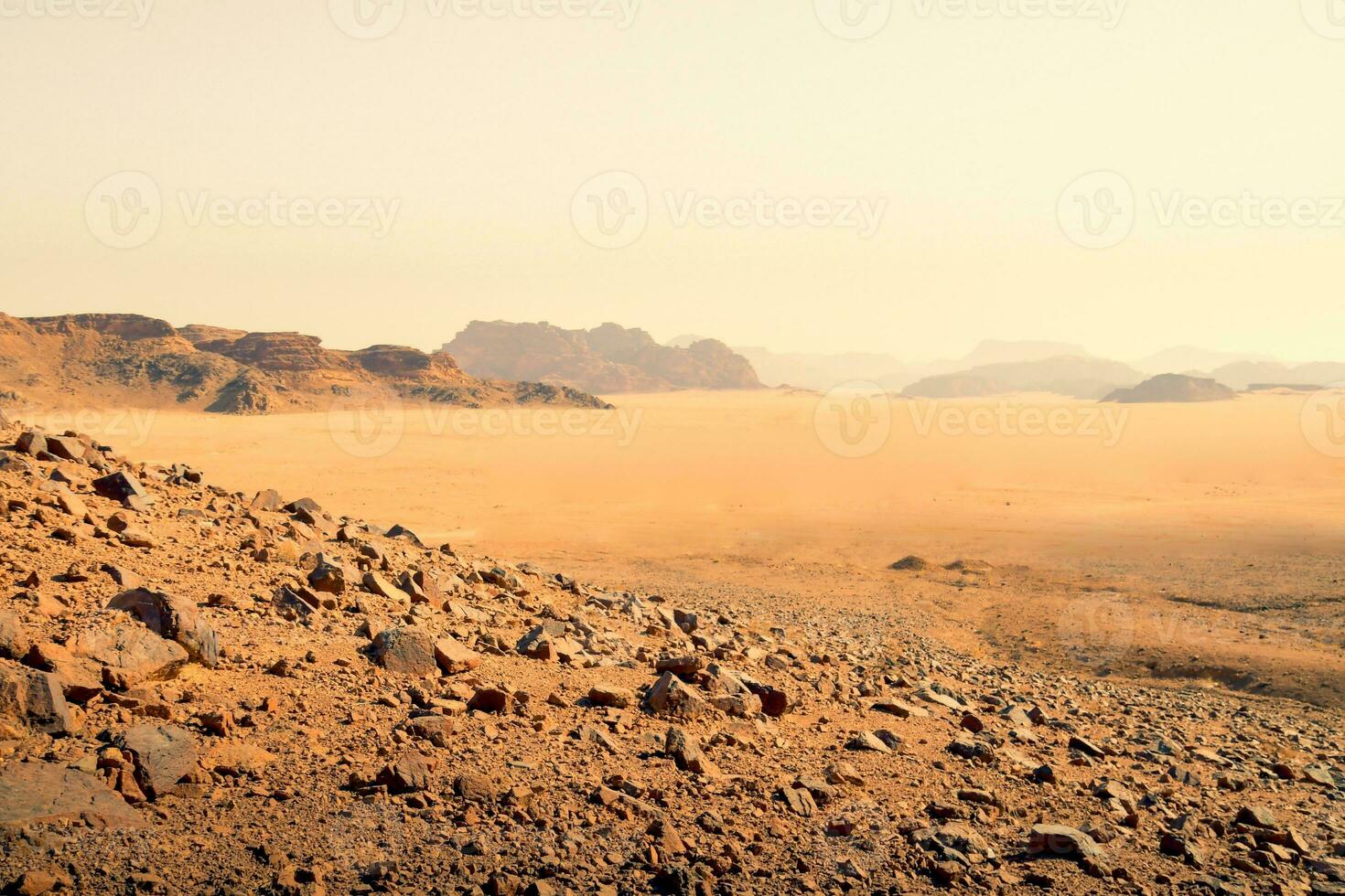 Planet Mars like landscape - Photo of Wadi Rum desert in Jordan with red pink sky above, this location was used as set for many science fiction movies