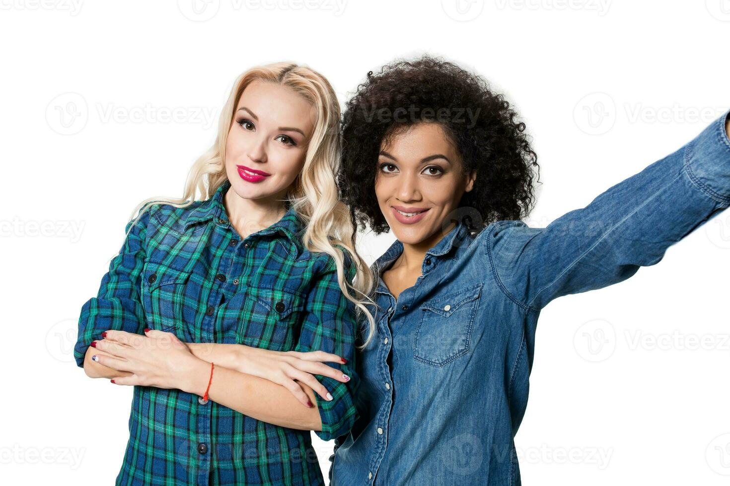 Two beautiful girls making selfie photo