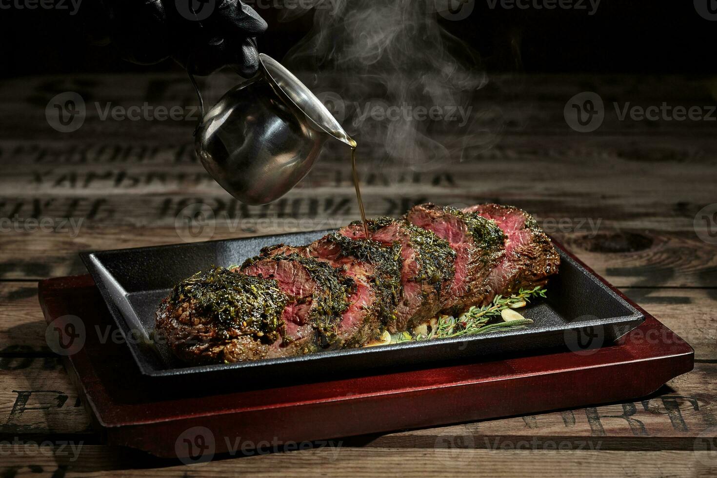 Sliced Japanese style beef steak seasoned with sauce photo