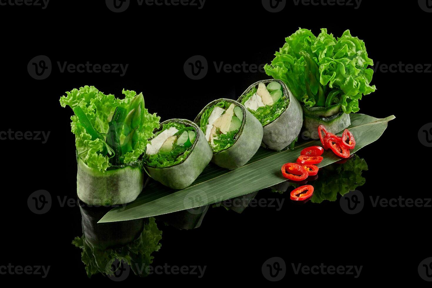 Green roll in mamenori with tofu, wakame, asparagus, avocado, cucumber, lettuce photo