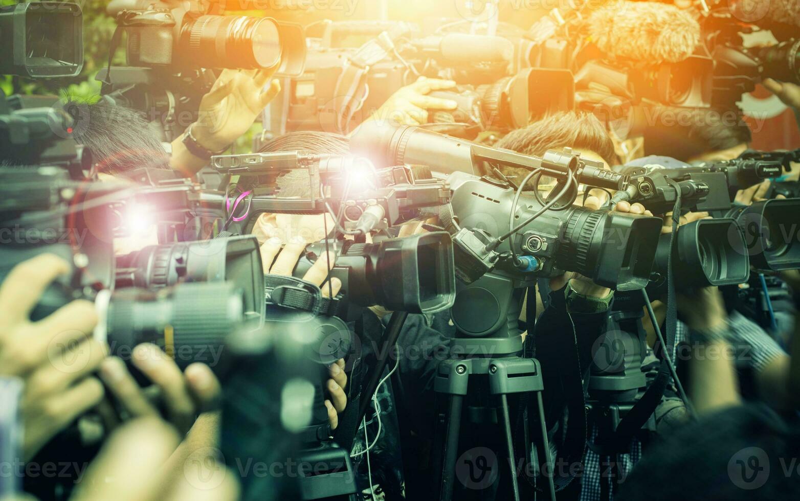 large number of press and media reporter in broadcasting event photo