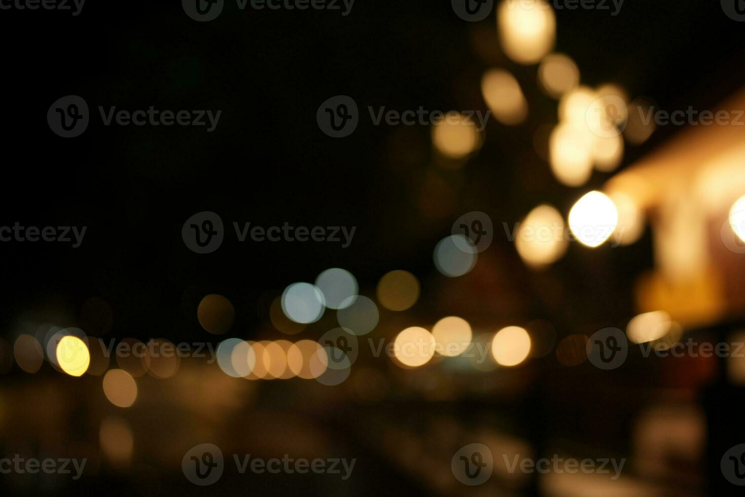 Black background  Horizontal background with blur bokeh effects for christmas time. Special occasion concept with space for text. photo