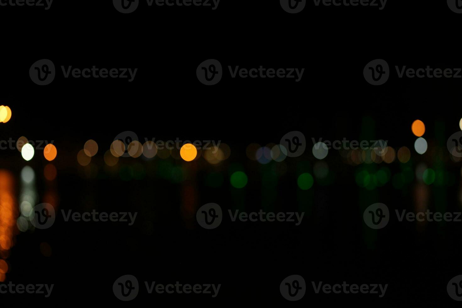 Black background  Horizontal background with blur bokeh effects for christmas time. Special occasion concept with space for text. photo
