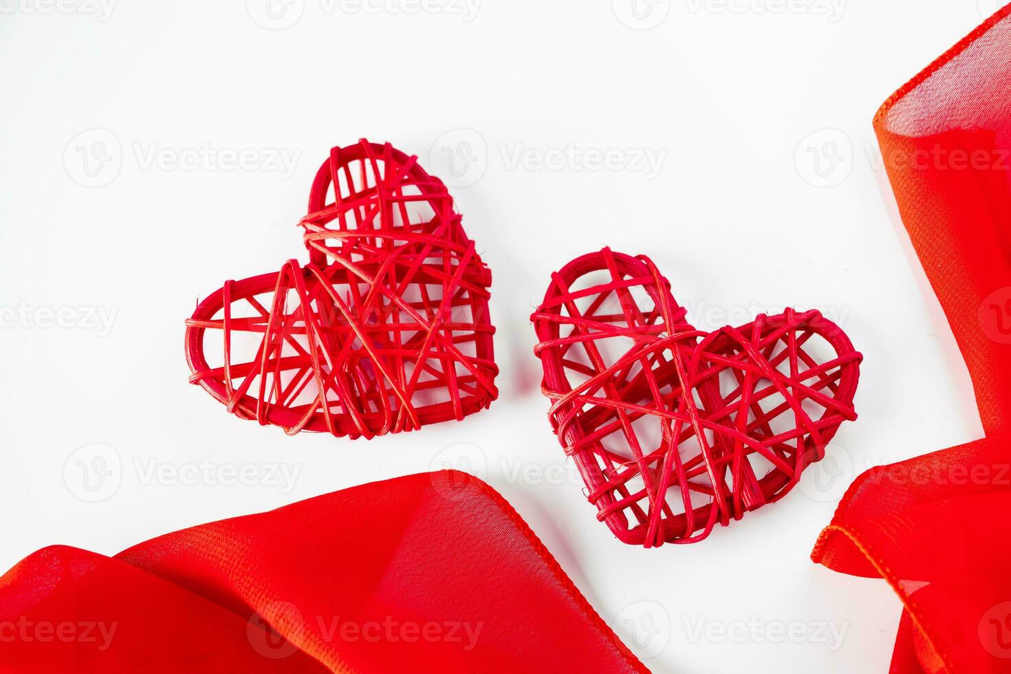 two red ceramic hearts on love letter paper background - a Royalty Free  Stock Photo from Photocase