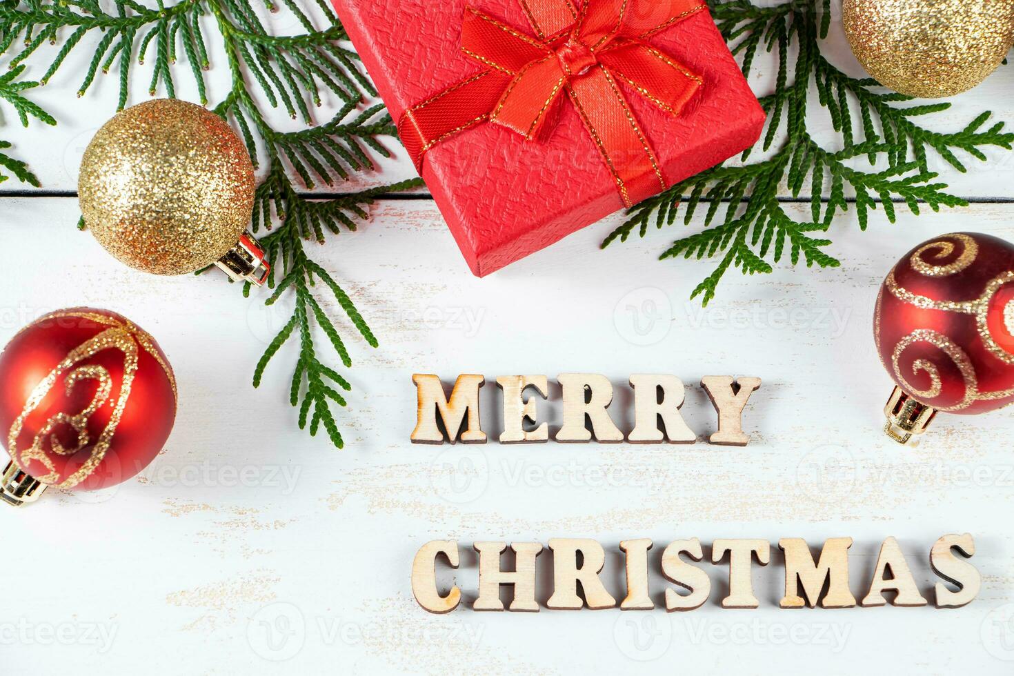 Merry Christmas concept. Gift boxes and festive decor on white background. photo