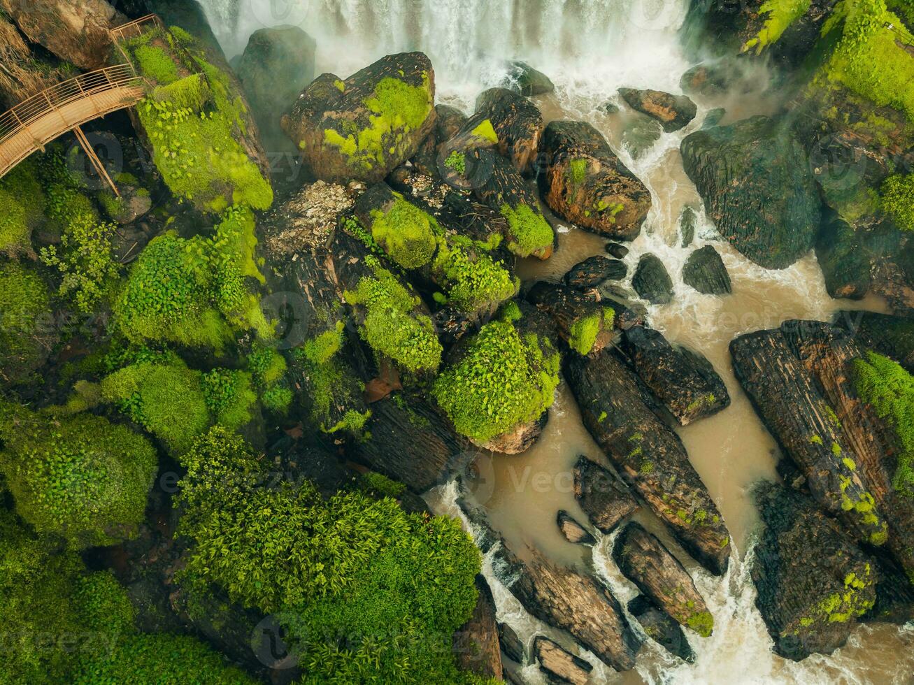 Aerial view of Thac Voi - Elephant waterfall, forest and city scene near Dalat city and Linh An pagoda in Vietnam photo