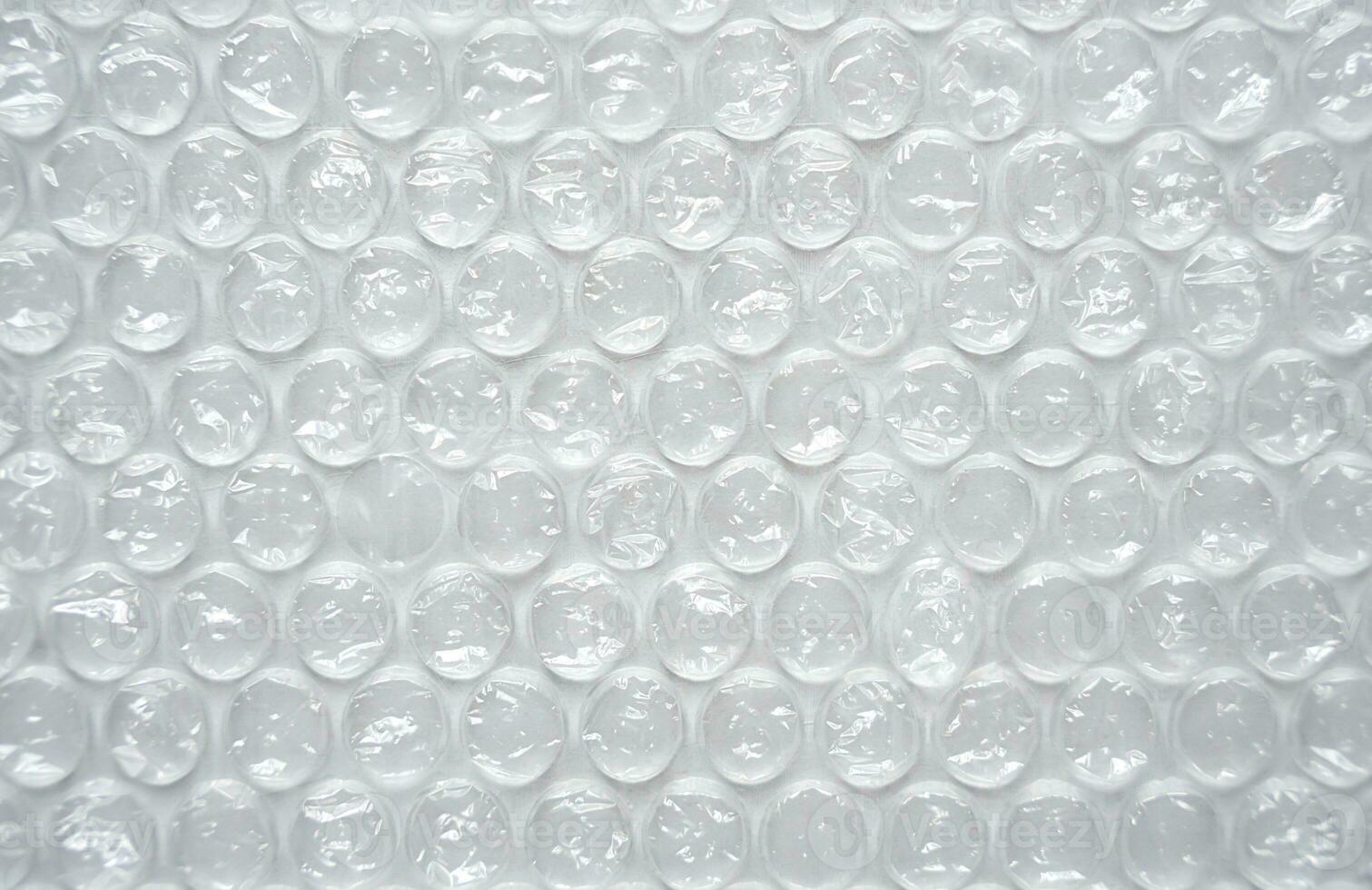 The texture of the packaging bubble film. Abstract background. Close-up. Selective focus. photo