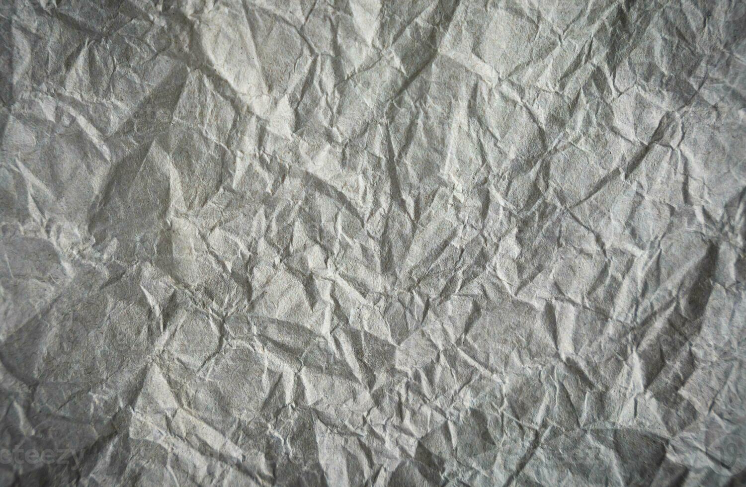 Crumpled gray paper. Abstract background. Banner. Copy space. Selective focus. photo
