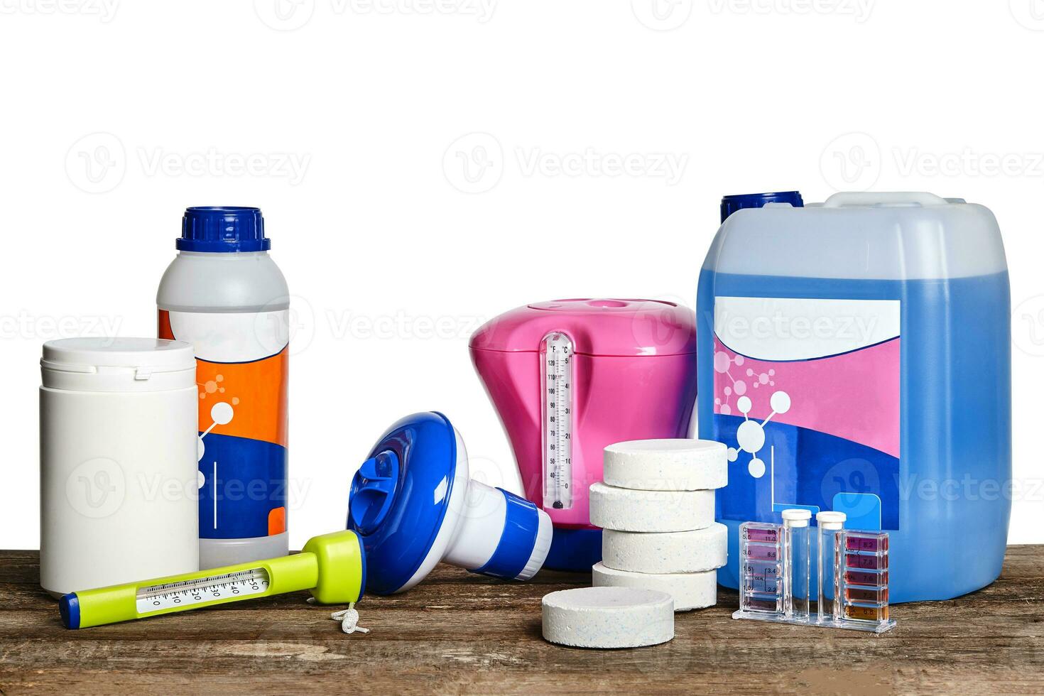 Equipment with chemical cleaning products and tools for the maintenance of the swimming pool on a wooden surface against white background. photo