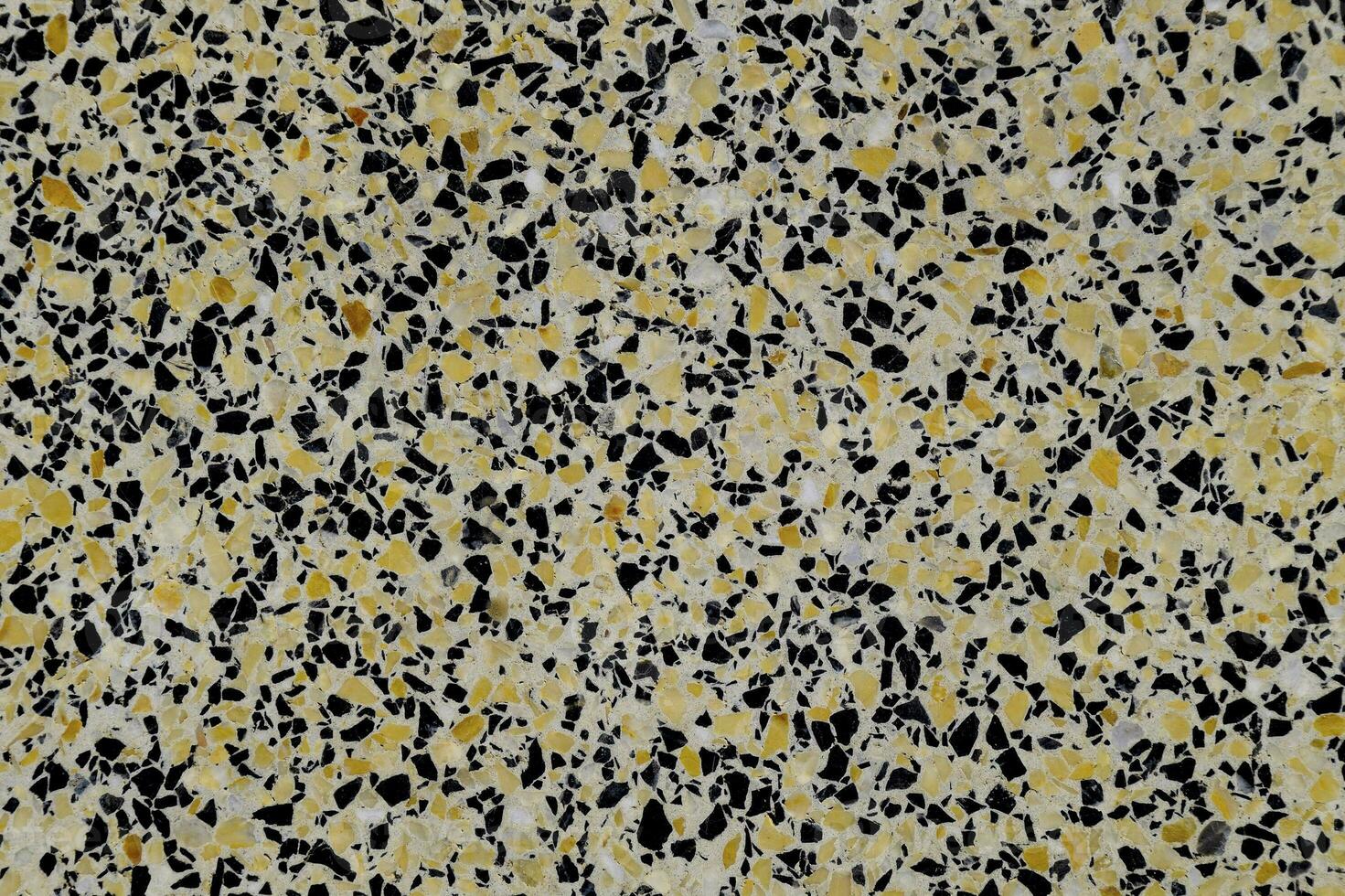Marble tiles interspersed with granite. The texture of paving sl photo