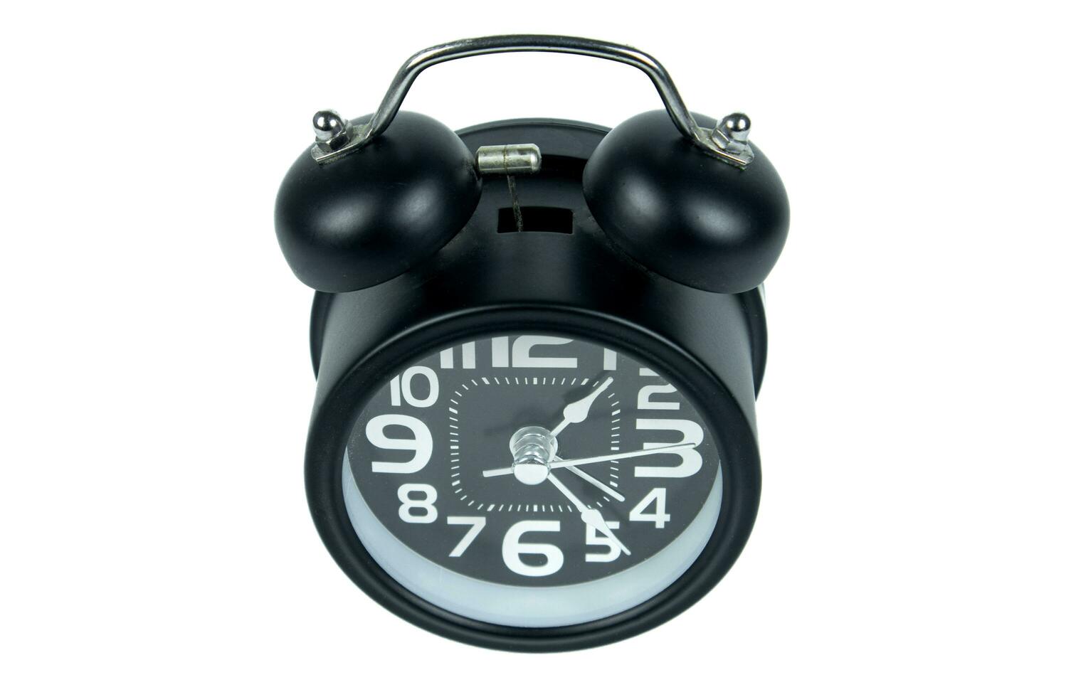 Black alarm clock isolated on white background photo