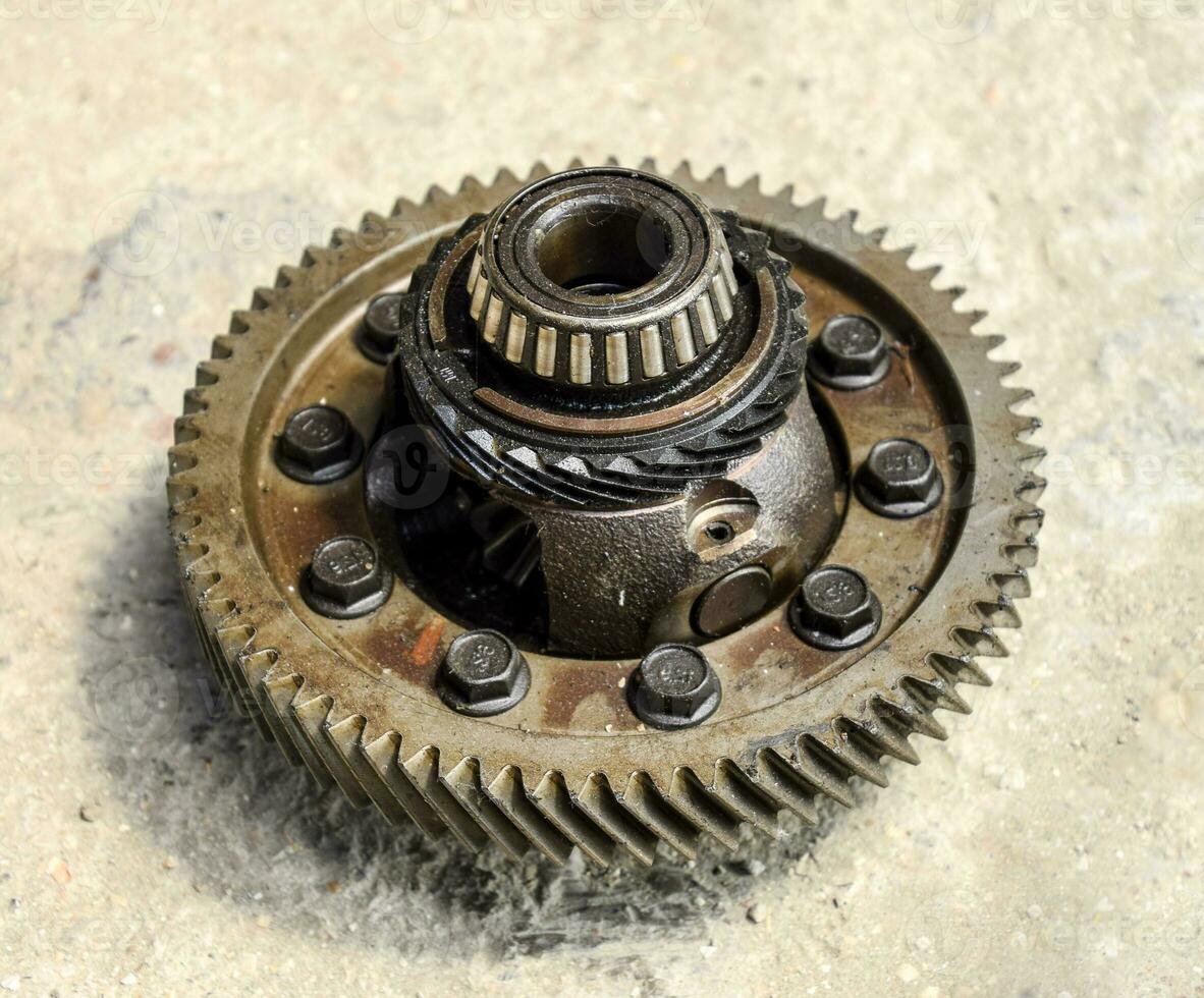 Dismantled box car transmissions. Gear with bearings. The gears photo