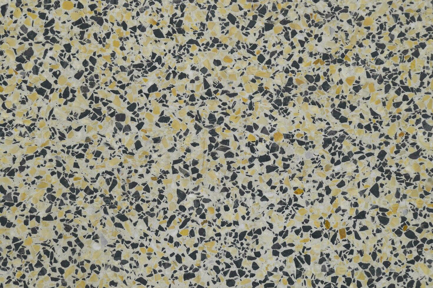 Marble tiles interspersed with granite. The texture of paving sl photo