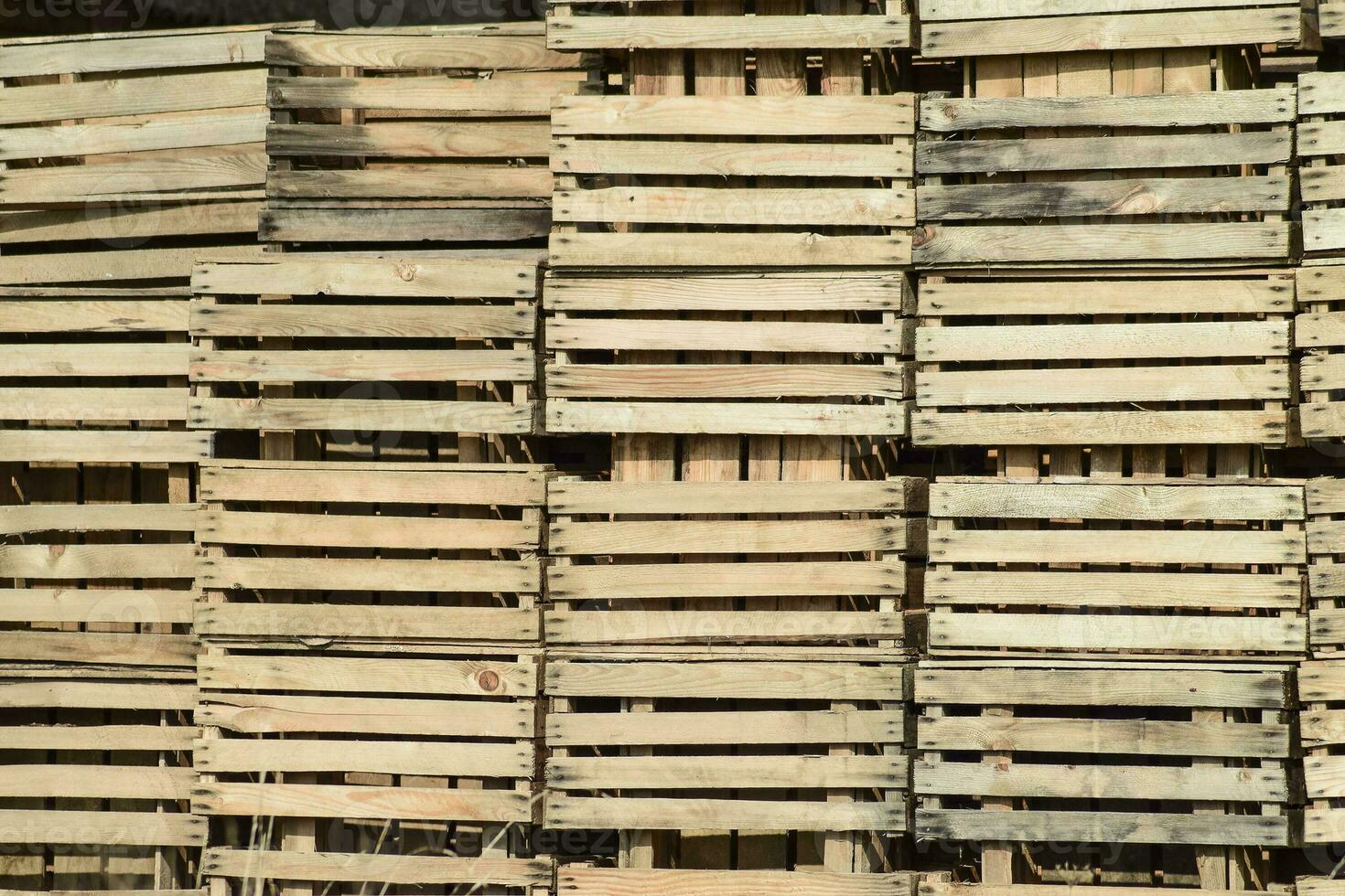 Wooden boxes stacked together. Warehouse empty wooden containers photo