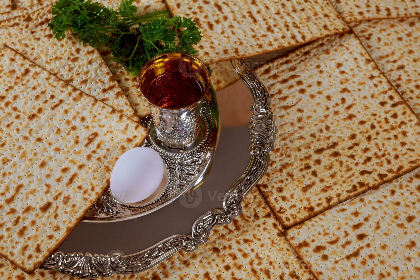 Jewish holiday Passover background matzo and wine photo