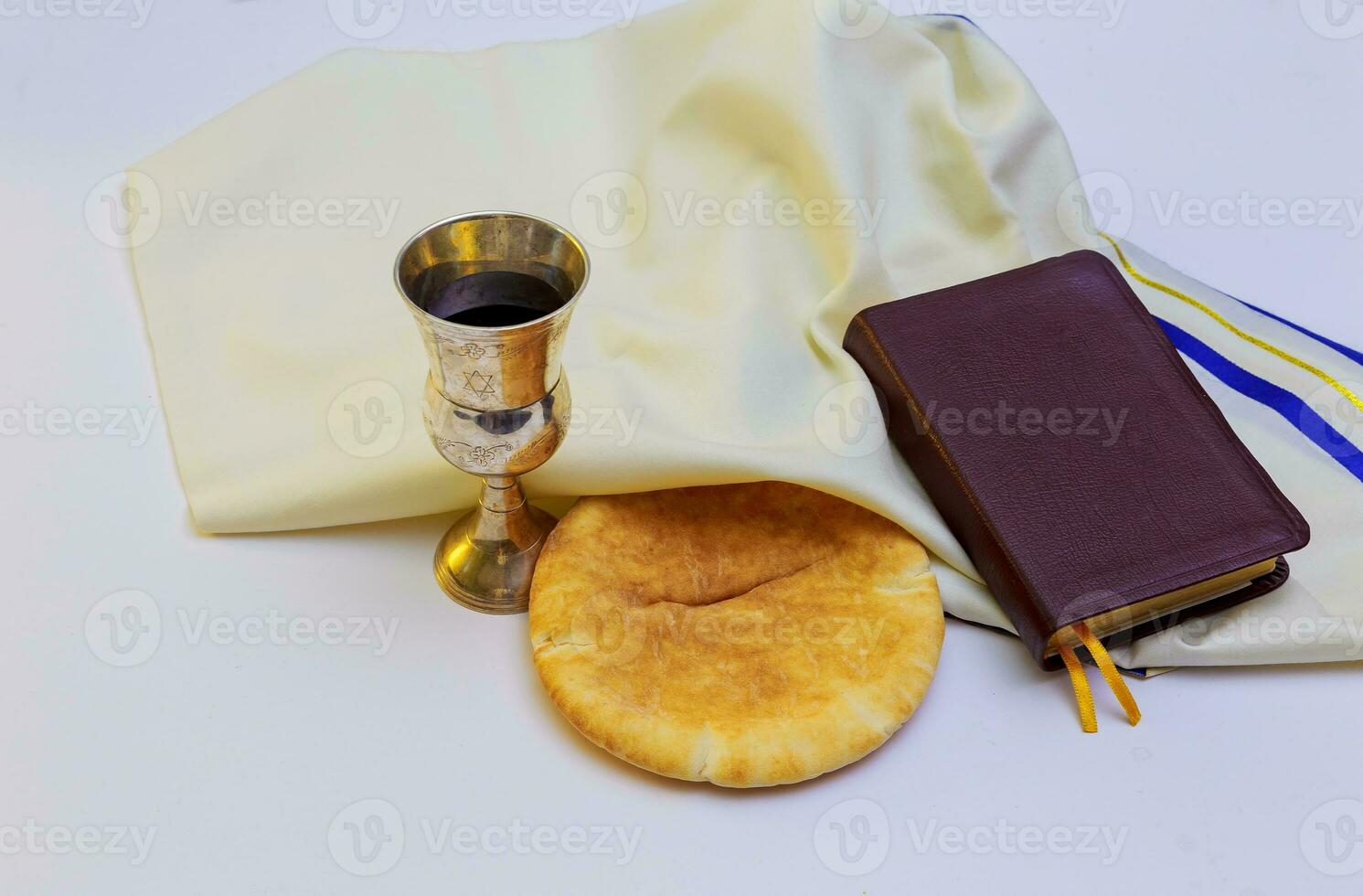Red wine, bread and Holy Bible photo