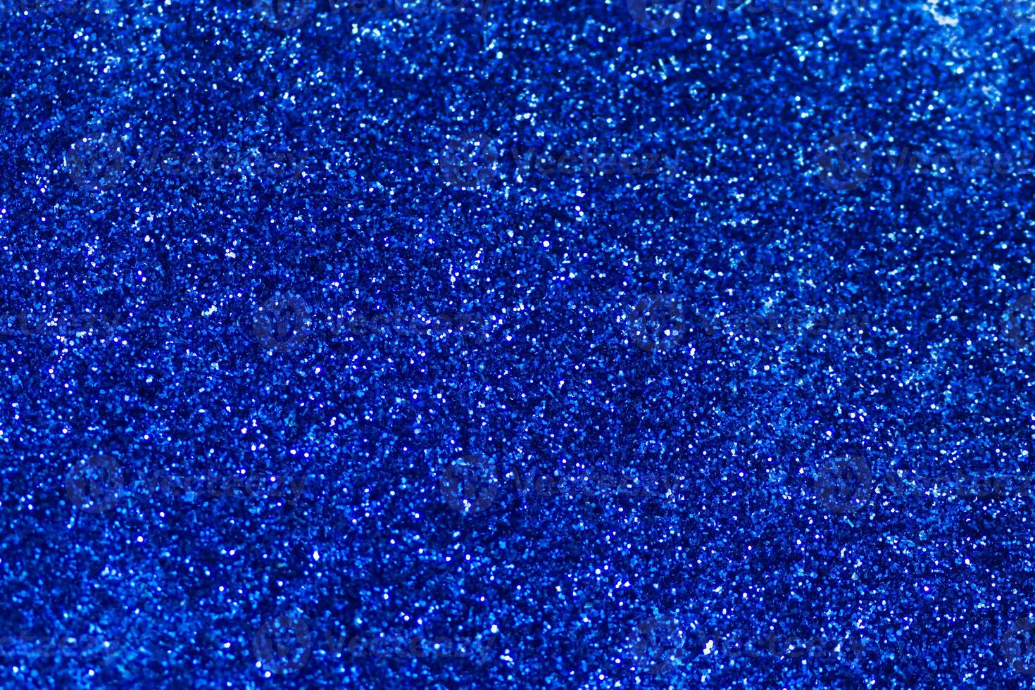 Blue Sparkling Glitter bokeh Background. photo