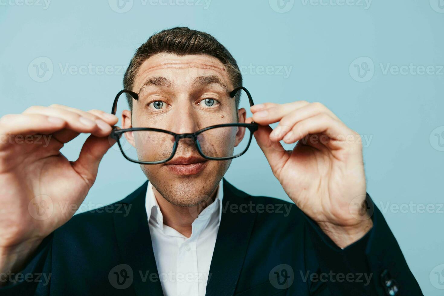 Stylish serious looking glasses positive expression men funny handsome party crazy human gesture photo
